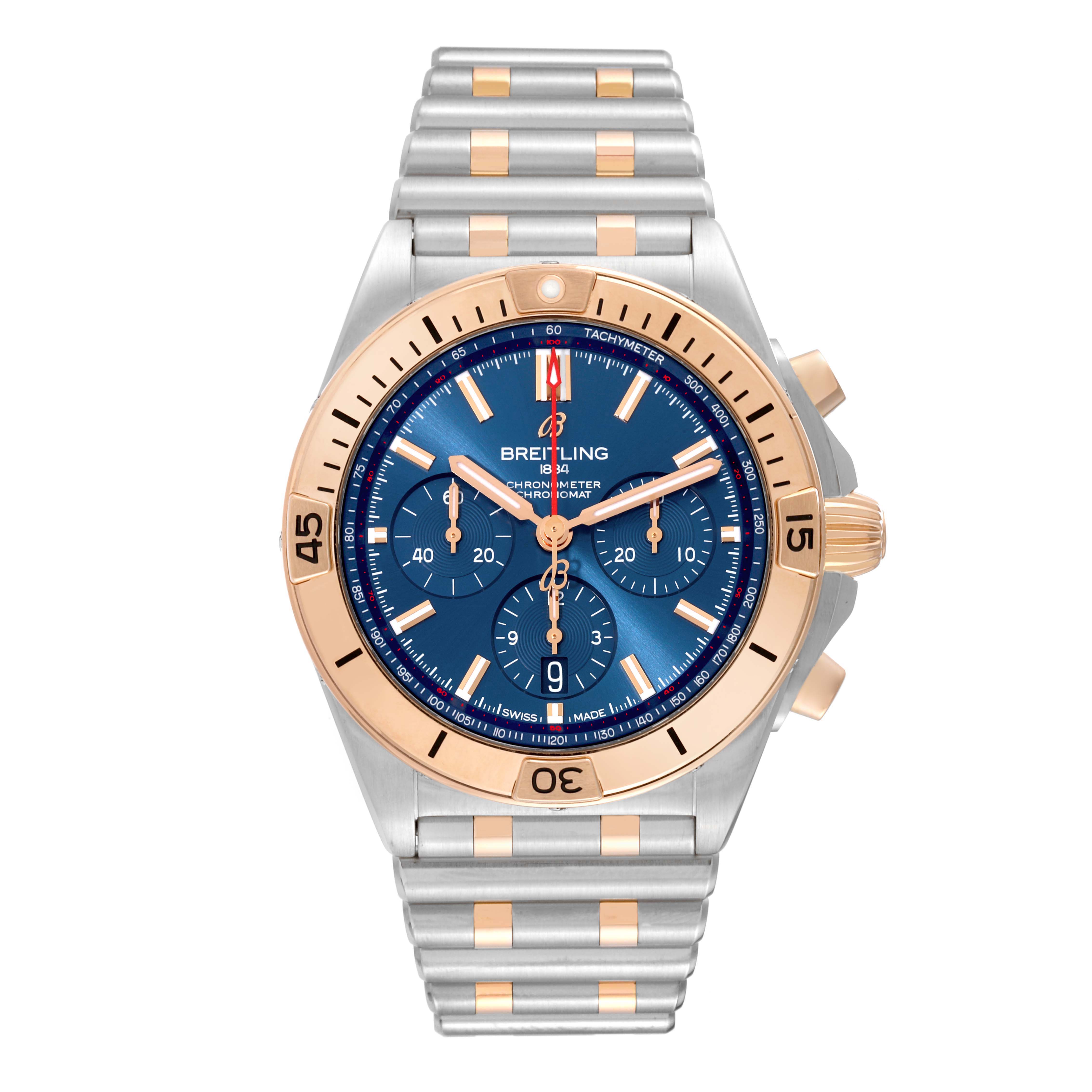 The Breitling Chronomat UB0134101C1U1 Men's Steel and Gold (two tone) Blue Dial is shown from the front, highlighting its blue dial, rose gold bezel, and two-tone metal bracelet.
