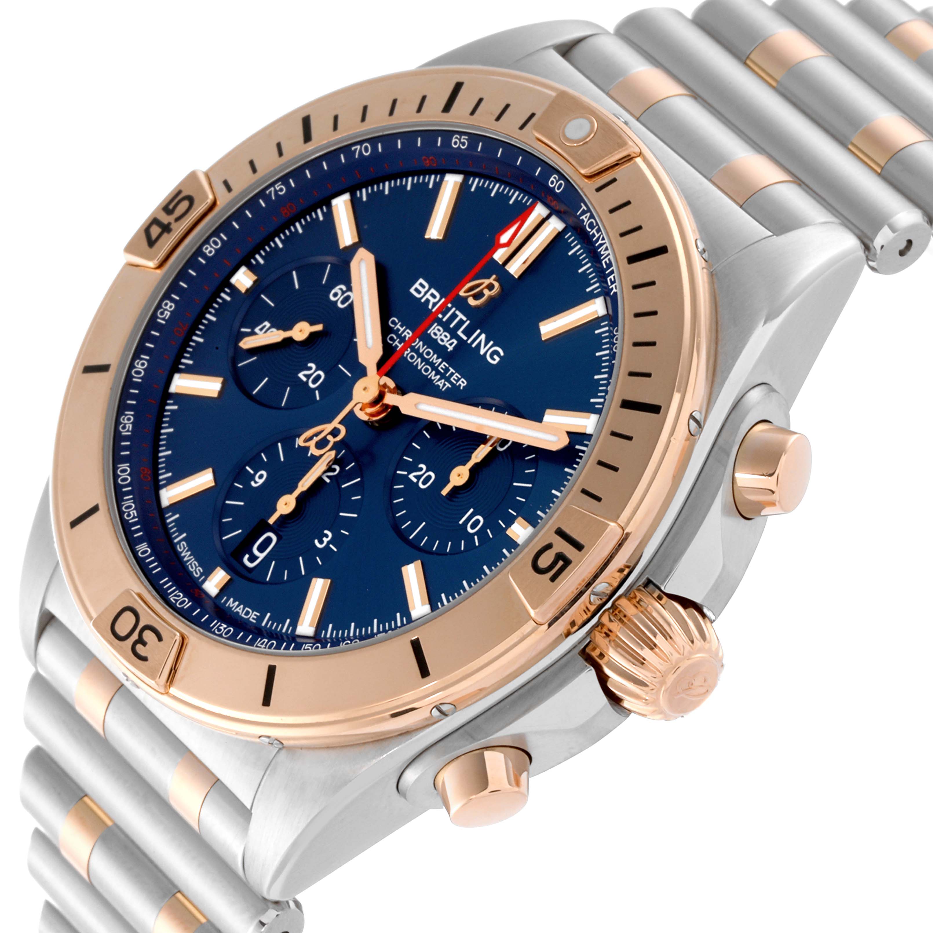 The image shows a Breitling Chronomat UB0134101C1U1 Men's Steel and Gold (two tone) Blue Dial UB0134101C1U1 Men's Steel and Gold (two tone) Blue Dial watch viewed from a slight angle, highlighting the bezel, dial, and part of the bracelet.