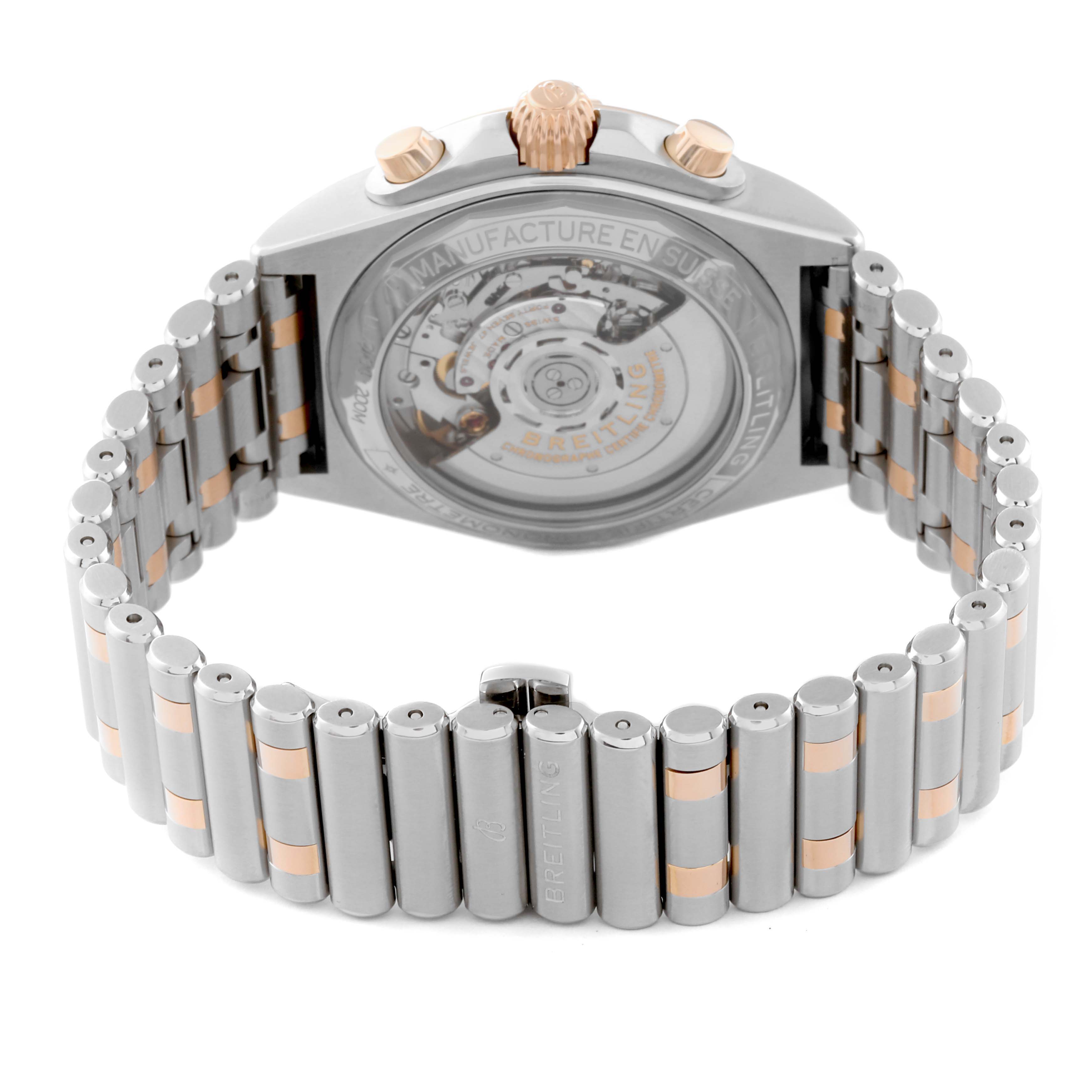 The image shows the rear view of the Breitling Chronomat UB0134101C1U1 Men's Steel and Gold (two tone) Blue Dial UB0134101C1U1 Men's Steel and Gold (two tone) Blue Dial watch, highlighting the case back and bracelet.