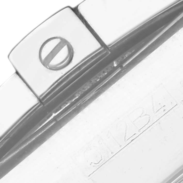 This image shows a close-up of the clasp and part of the metal strap of a Breitling Chronomat AB0140 Men's Stainless Steel Black Dial AB0140 Men's Stainless Steel Black Dial watch.