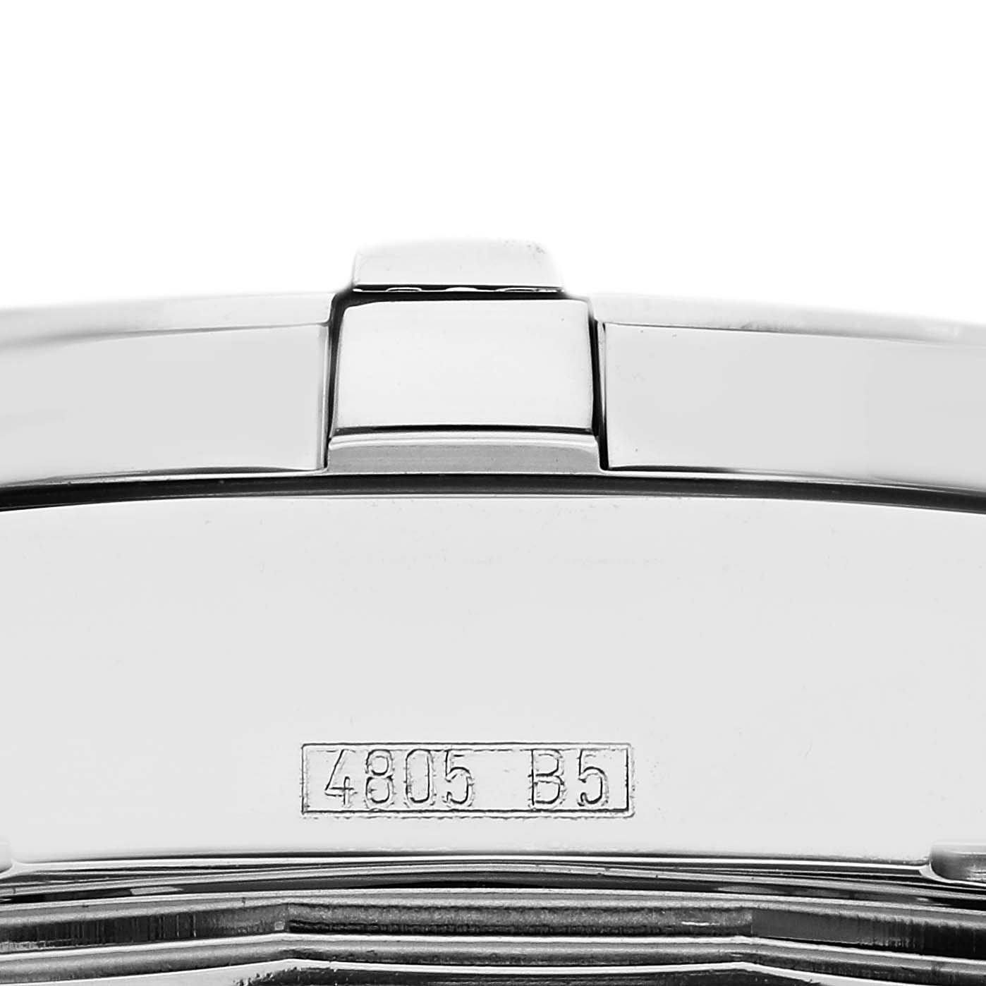 The image shows the side of a Breitling Colt A17380 Men
s Stainless Steel Blue Dial A17380 Men
s Stainless Steel Blue Dial watch case with a visible clasp and serial number.