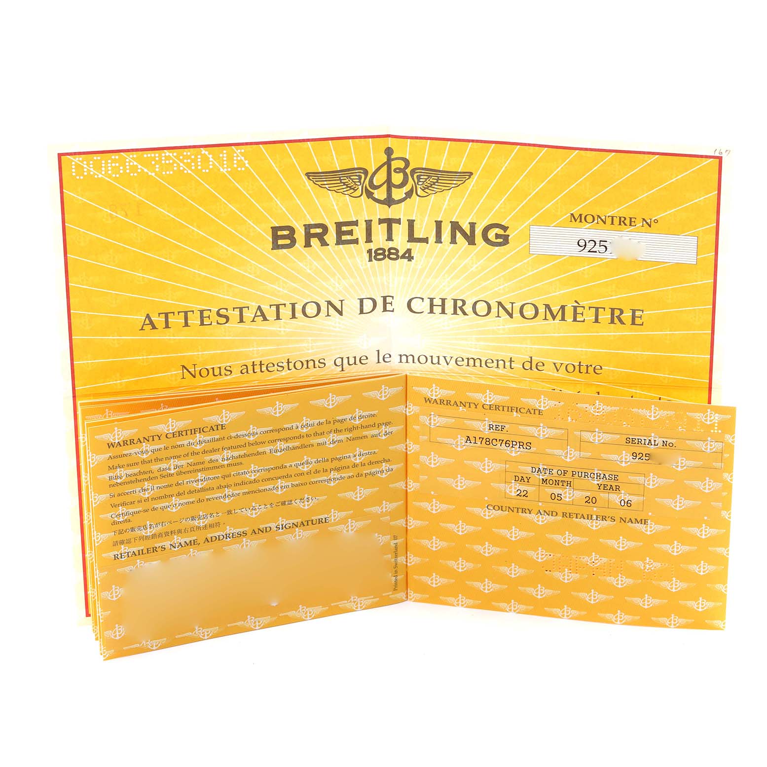 The image shows warranty and chronometer certificates for the Breitling Colt A17380 Men
s Stainless Steel Blue Dial A17380 Men
s Stainless Steel Blue Dial watch model, displayed flat and opened.