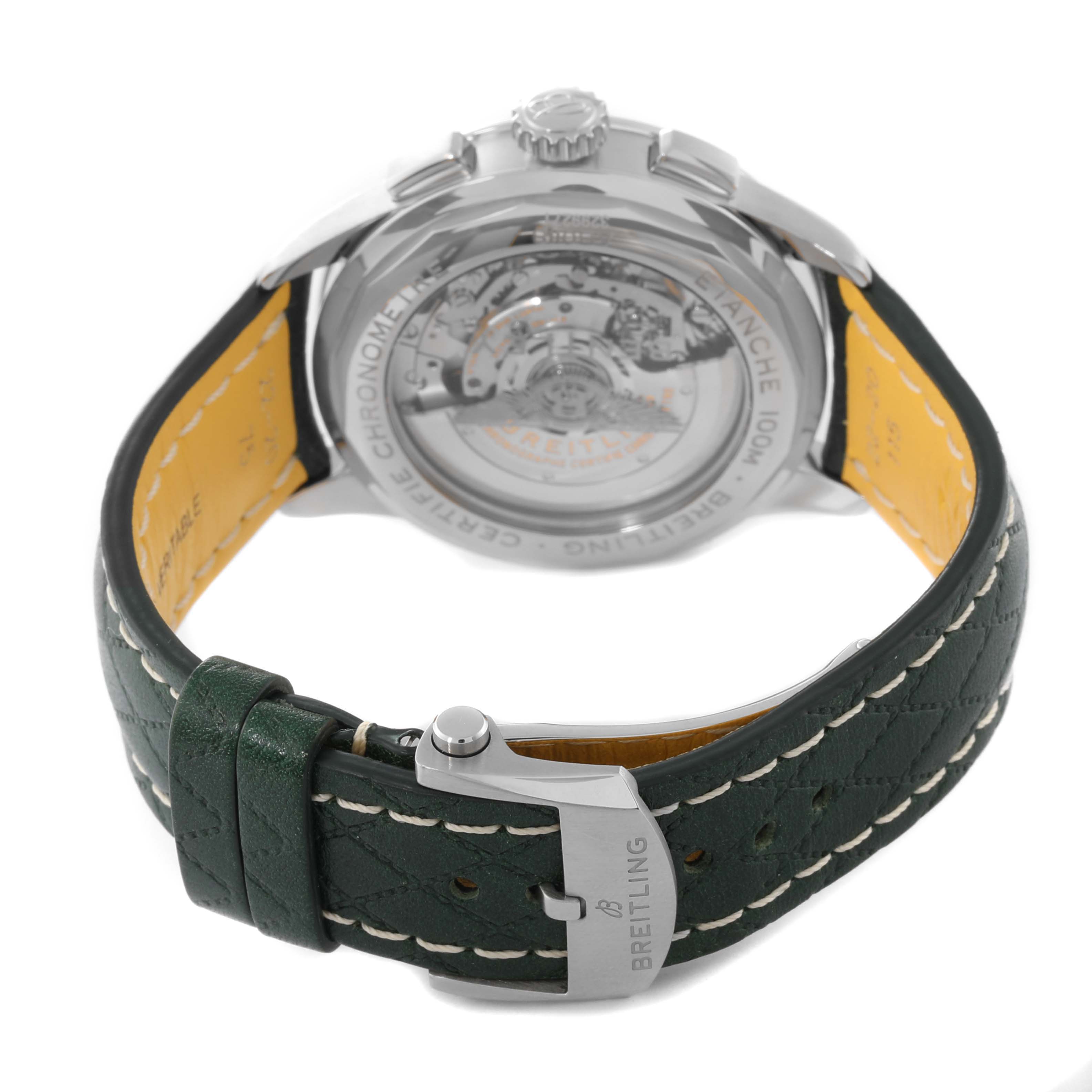 The image shows the back view of a Breitling Premier AB0118 Men's Stainless Steel Green Dial AB0118 Men's Stainless Steel Green Dial watch, highlighting its green leather strap and transparent case back.