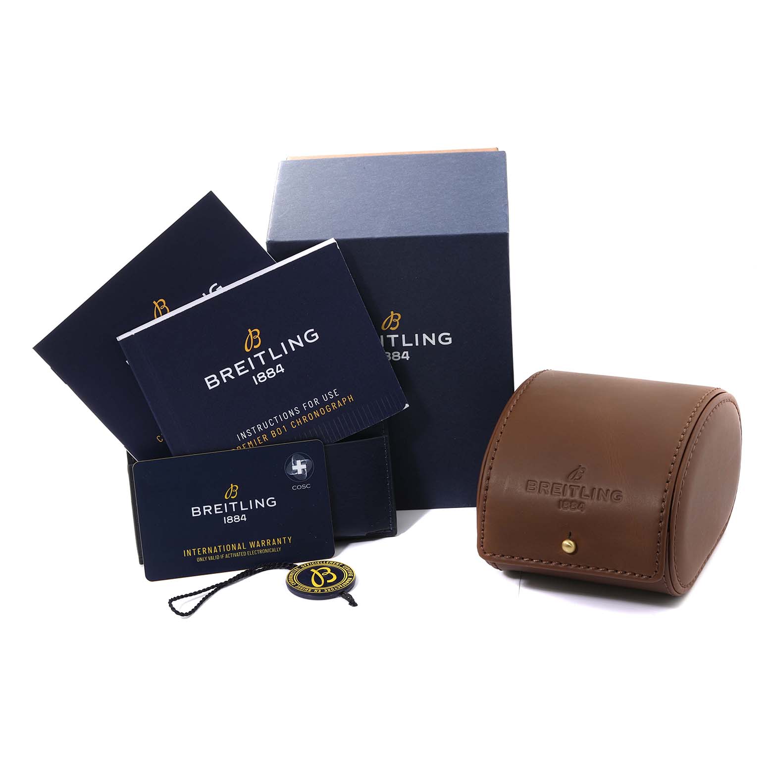 The image shows the Breitling Premier AB0118 Men's Stainless Steel Green Dial AB0118 Men's Stainless Steel Green Dial watch's packaging, including a brown leather case, boxes, warranty card, manuals, and a tag.