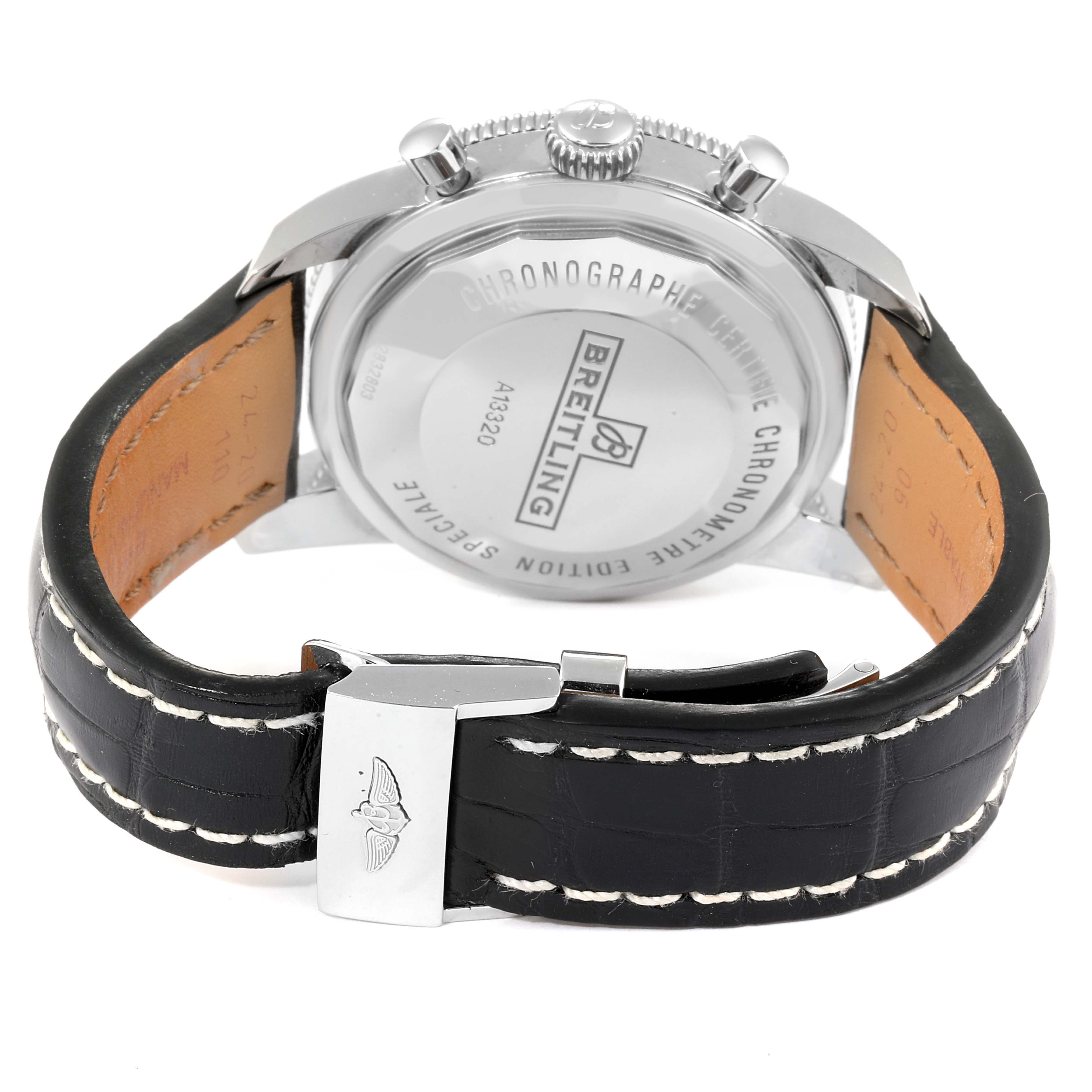 The image shows the back of a Breitling Superocean A13320 Men's Stainless Steel Blue Dial A13320 Men's Stainless Steel Blue Dial watch, highlighting its leather strap and engraved case back.