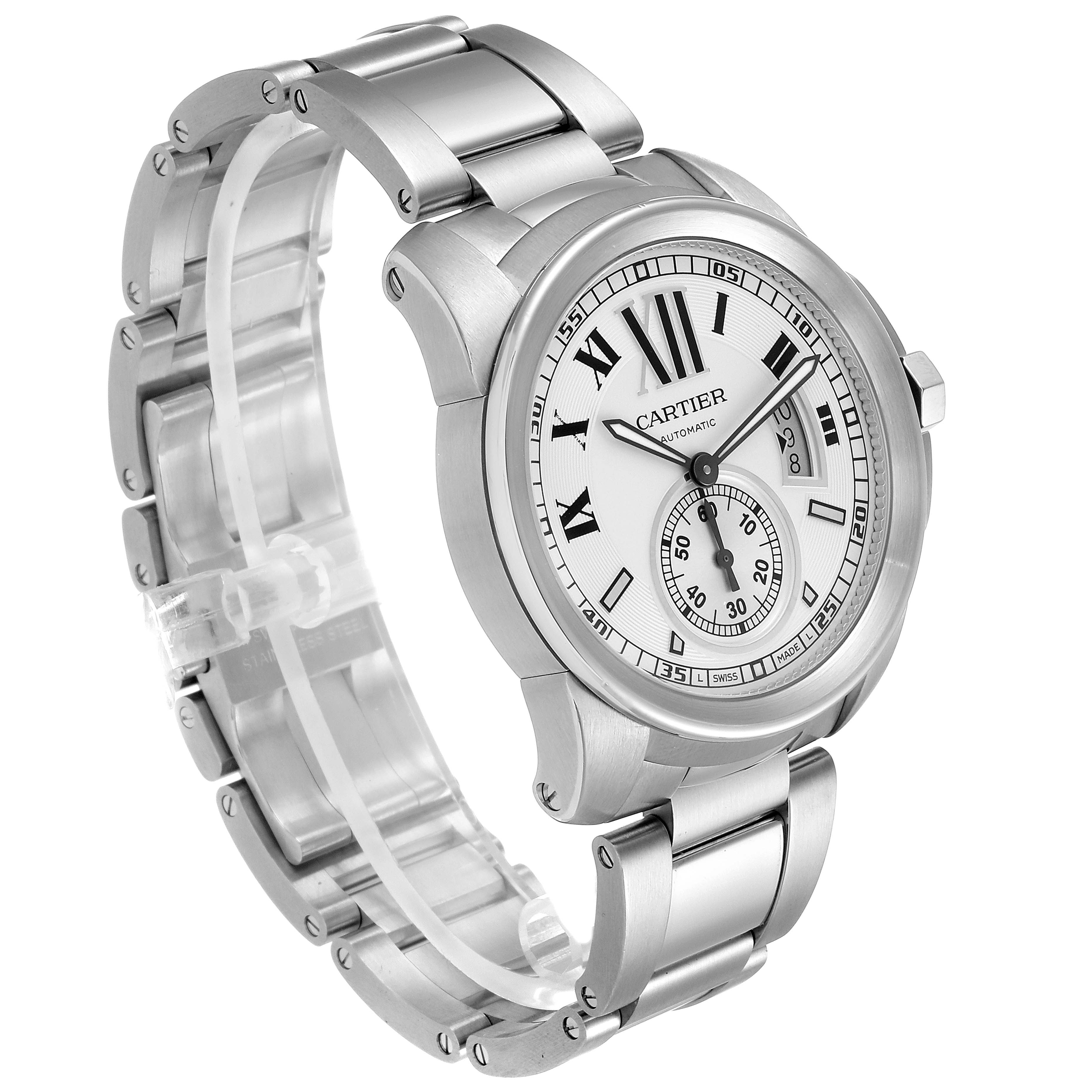 The Calibre de Cartier watch is shown from a front-left angle, displaying its face, bracelet, and crown.