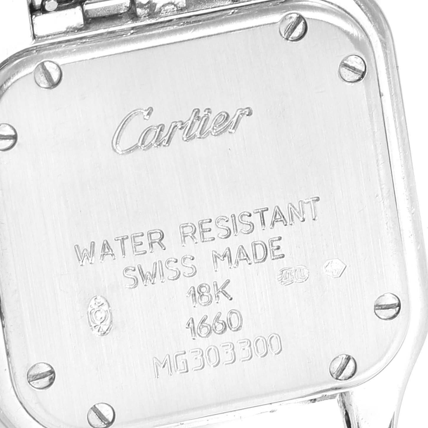 This image shows the back case of a Cartier Panthere WF3091F3 Women
s White Gold Silver Dial WF3091F3 Women
s White Gold Silver Dial watch, highlighting its engravings and screws.