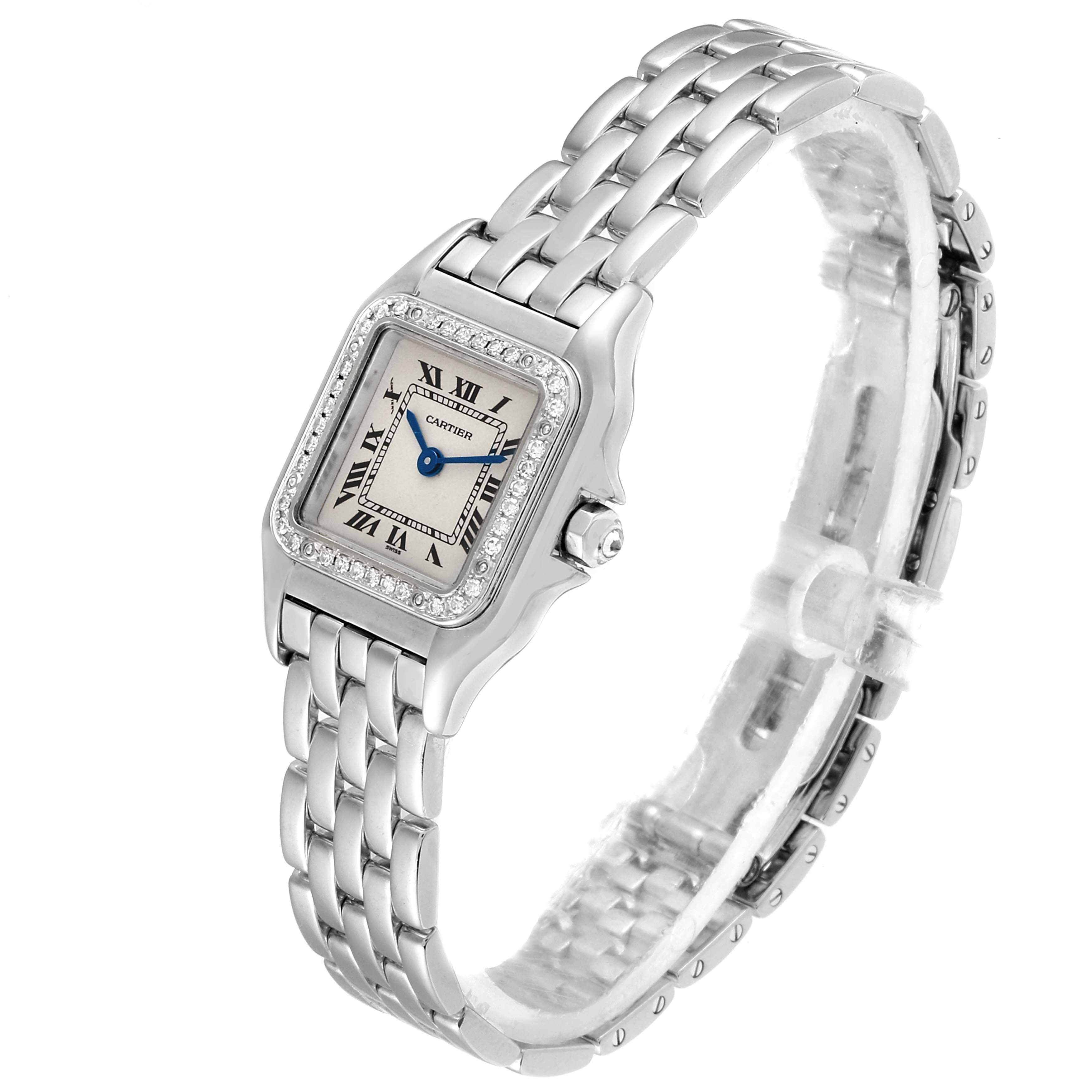 This image shows a Cartier Panthere WF3091F3 Women
s White Gold Silver Dial WF3091F3 Women
s White Gold Silver Dial watch from a three-quarter angle, highlighting its square face and metal bracelet.