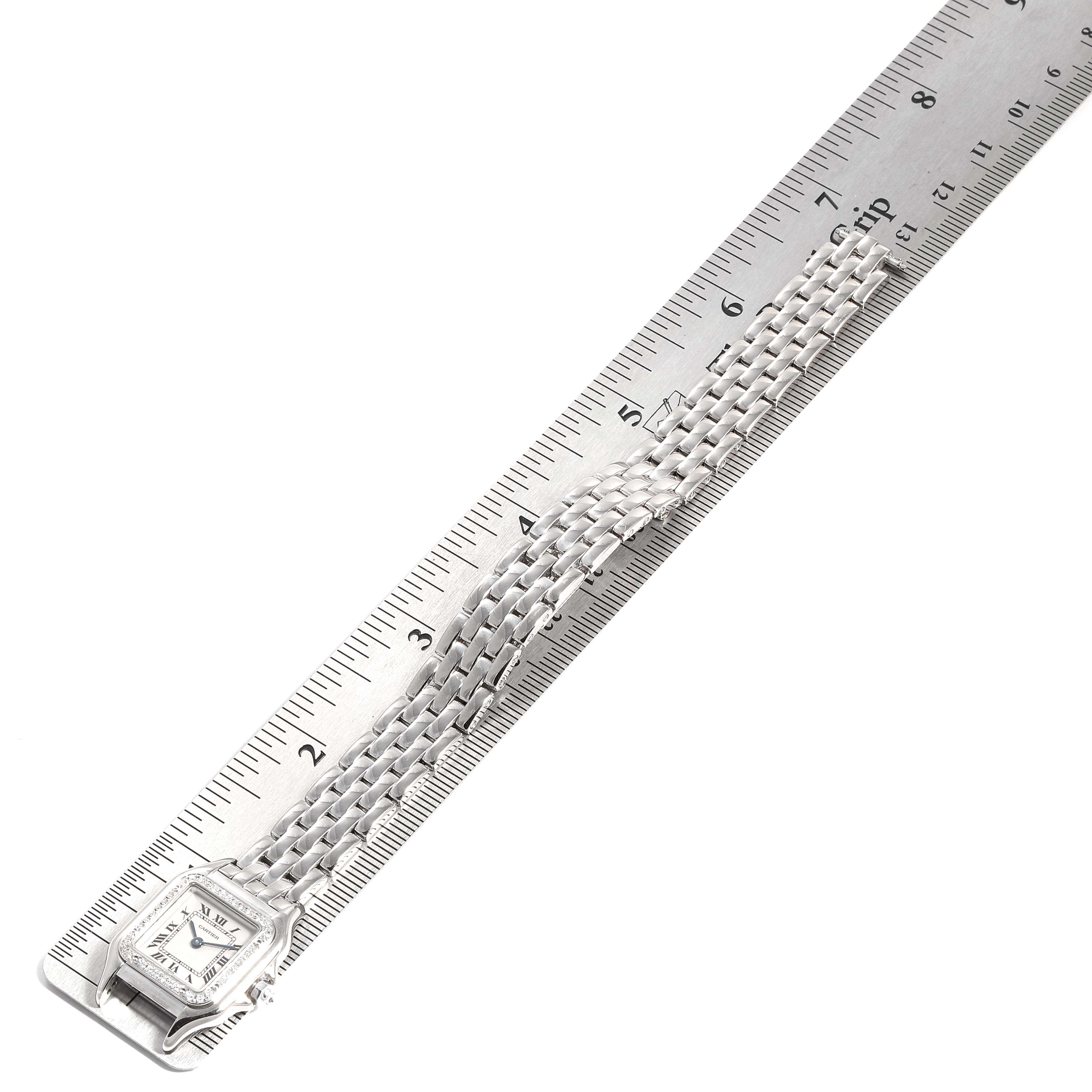 The image shows a Panthere model watch by Cartier, displaying its face and bracelet, measured against a ruler.