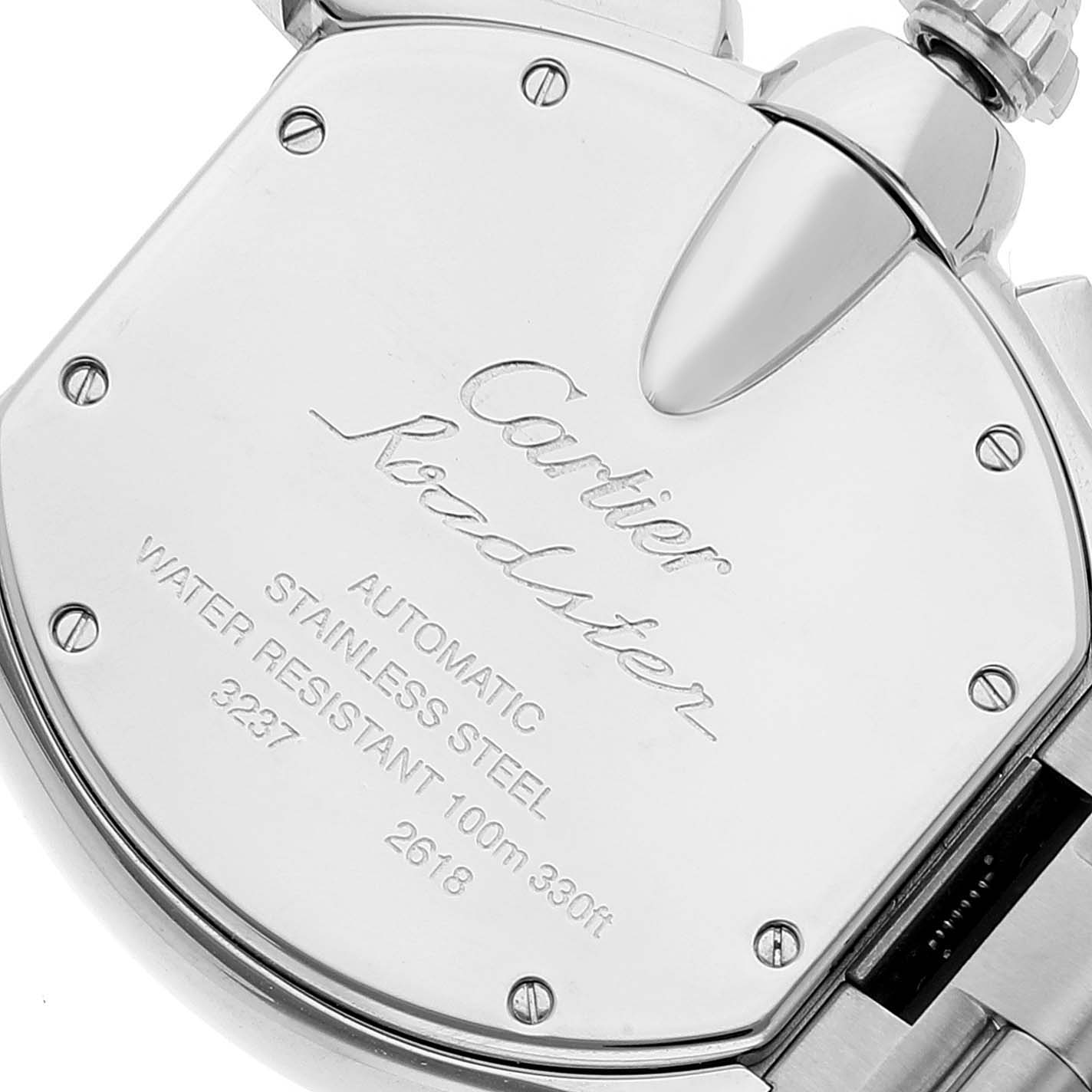 This image shows the back case of a Cartier Roadster W62007X6 Men's Stainless Steel Black Dial W62007X6 Men's Stainless Steel Black Dial watch, highlighting the engravings and screws.