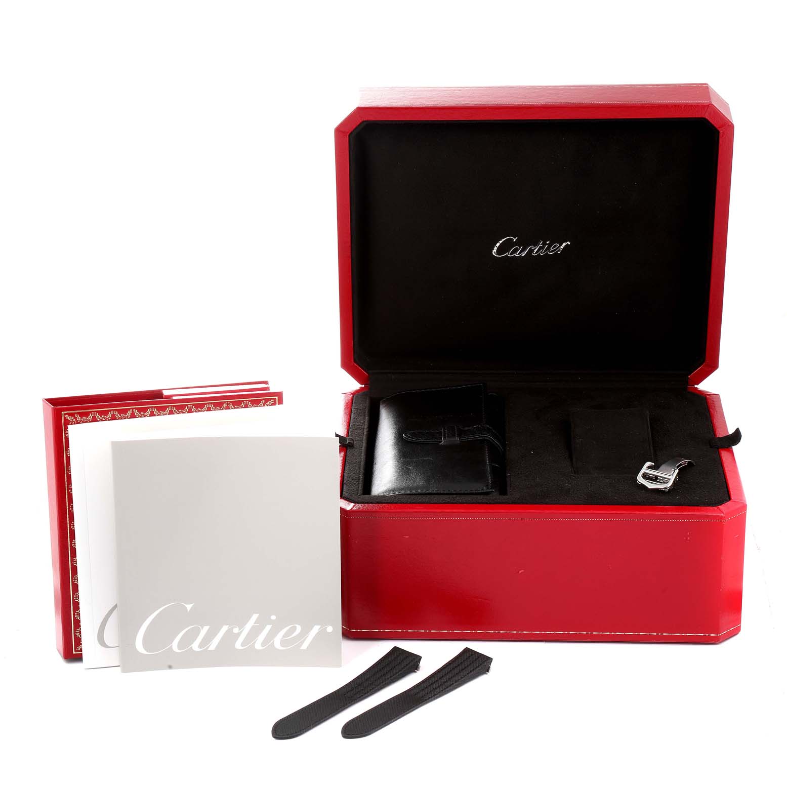 The image shows a Cartier Roadster W62007X6 Men's Stainless Steel Black Dial W62007X6 Men's Stainless Steel Black Dial watch box set with a red presentation box, booklets, extra straps, and a buckle.