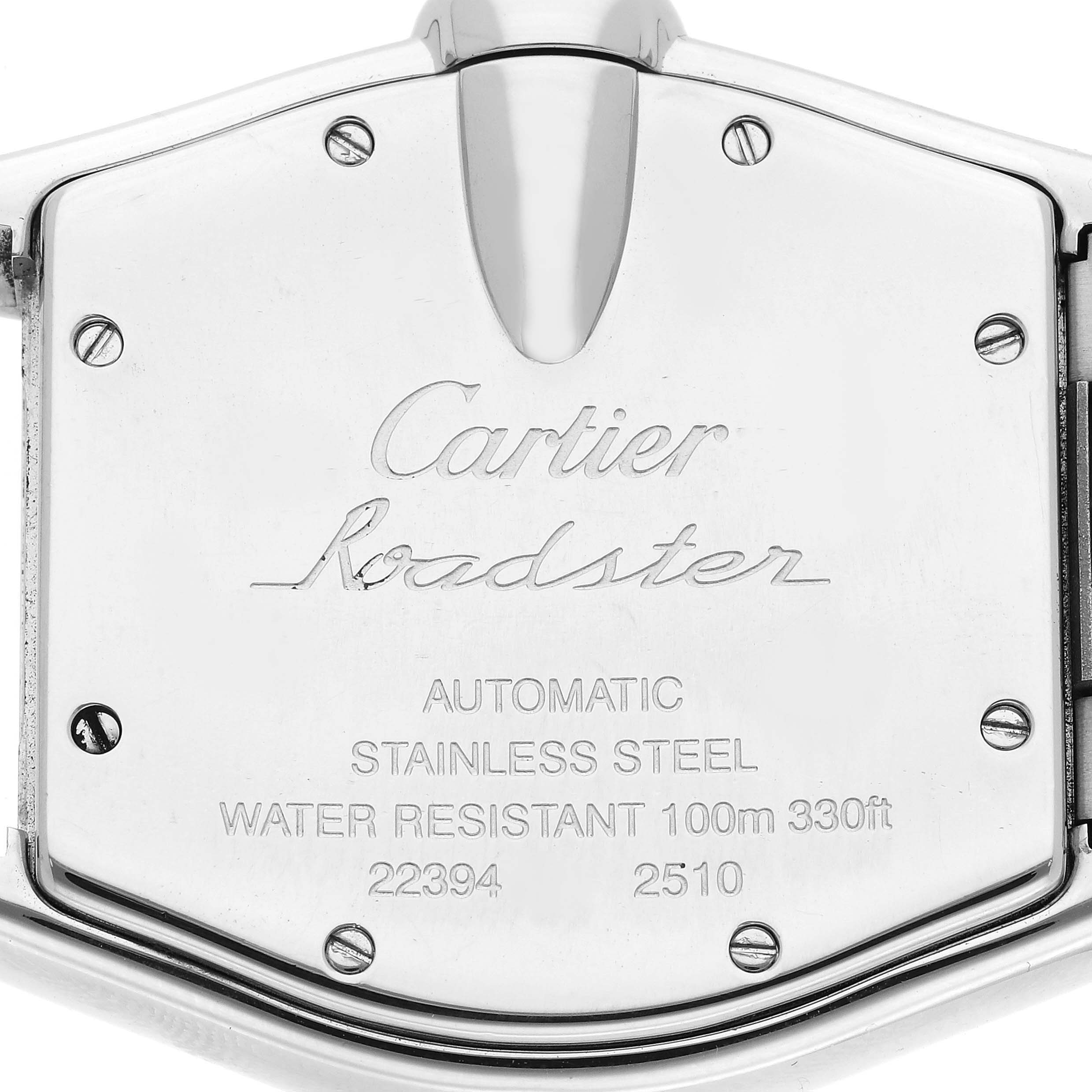 The image shows the backside of a Cartier Roadster W62001V3 Men's Stainless Steel Silver Dial W62001V3 Men's Stainless Steel Silver Dial watch, displaying its engravings and screws.
