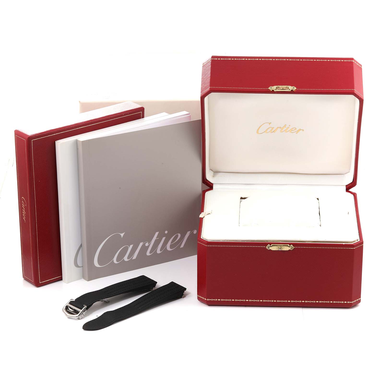 The image shows the packaging and accessories for a Cartier Roadster W62020X6 Men's Stainless Steel Black Dial W62020X6 Men's Stainless Steel Black Dial watch, including a red box, manuals, and spare straps.