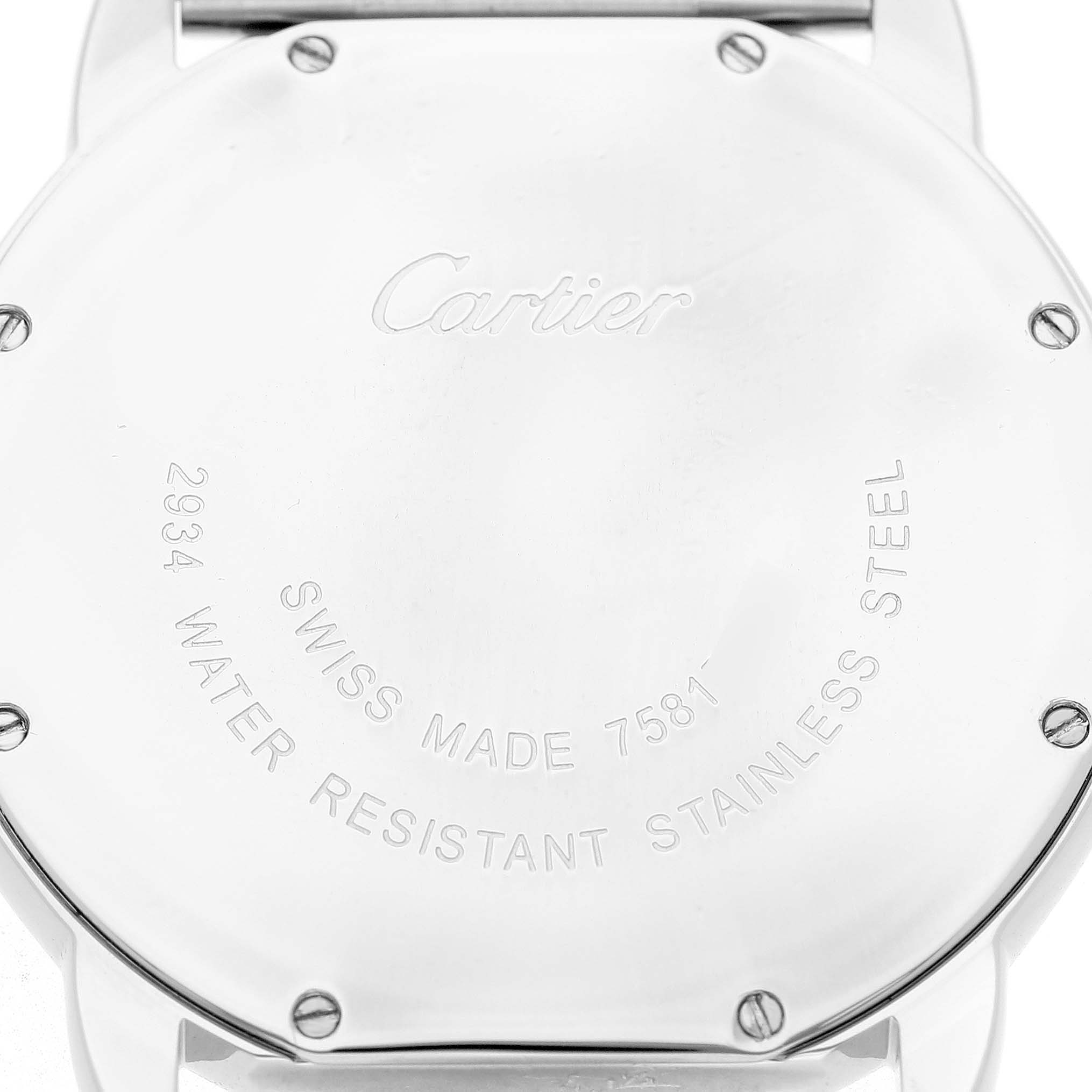 The image shows the back case of a Cartier Ronde W6701005 Men's Stainless Steel White Dial watch, featuring engraved details and screw accents.
