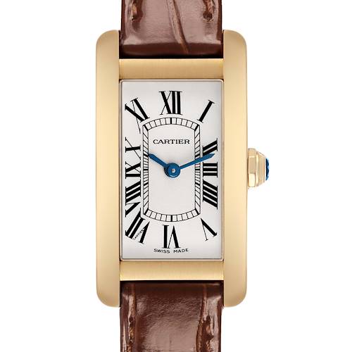 The Cartier Tank Americaine W2601556 Women's Yellow Gold White Dial watch is shown from a front angle, featuring its rectangular face, Roman numerals, and brown leather strap.