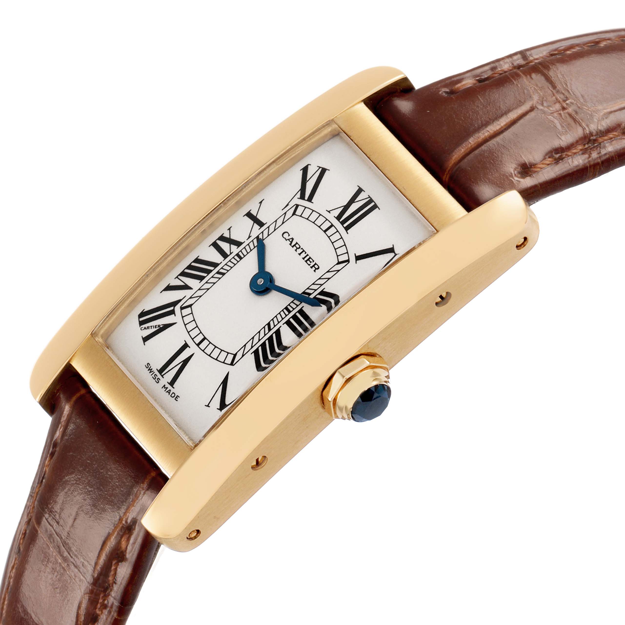The Cartier Tank Americaine W2601556 Women's Yellow Gold White Dial watch is shown at an angled side view, highlighting its gold case, Roman numeral dial, and brown leather strap.