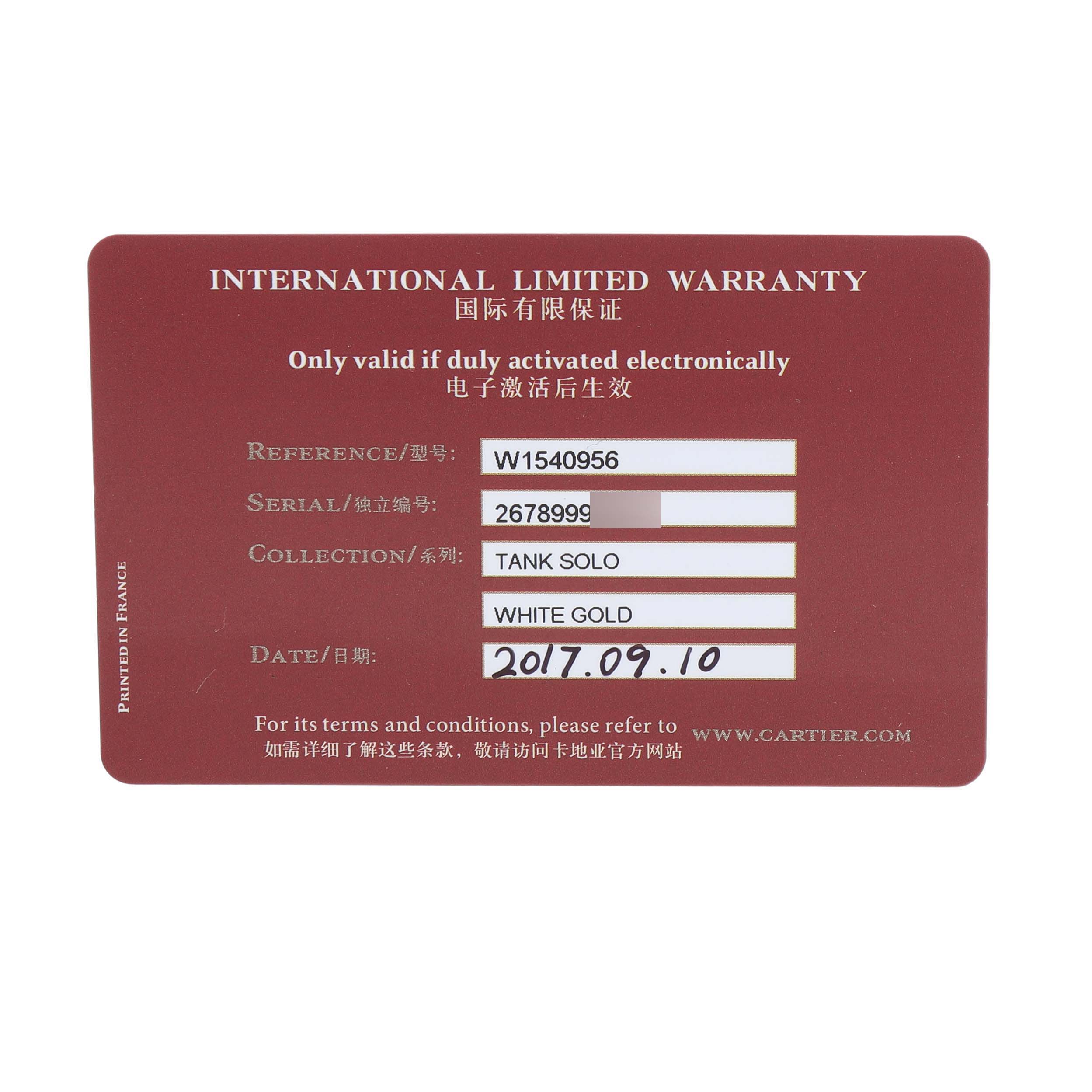 The image shows an international limited warranty card for a Cartier Tank Louis W1540956 Men's Stainless Steel Silver Dial model watch.