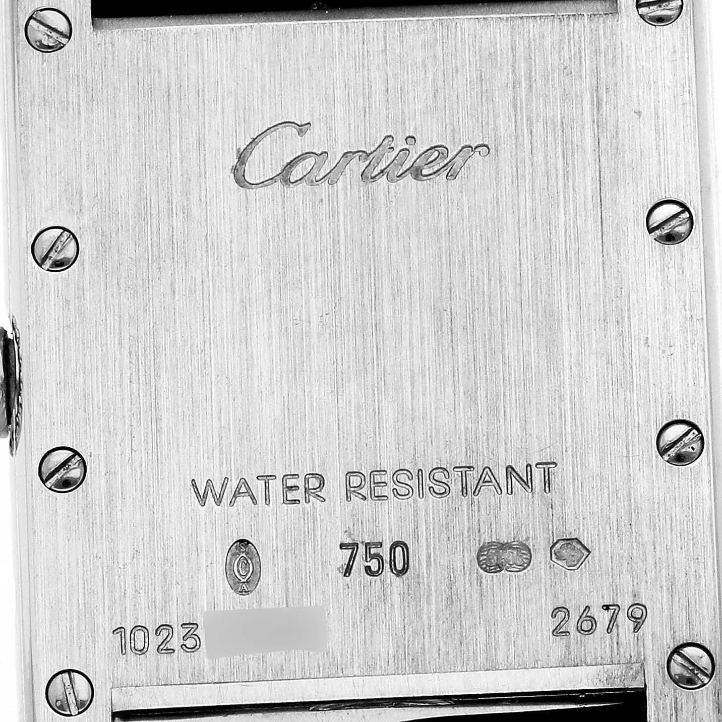 This image shows the back case of a Cartier Tank Louis W1541056 Women's White Gold Silver Dial W1541056 Women's White Gold Silver Dial model watch, displaying the brand name, water resistance, and various engravings.