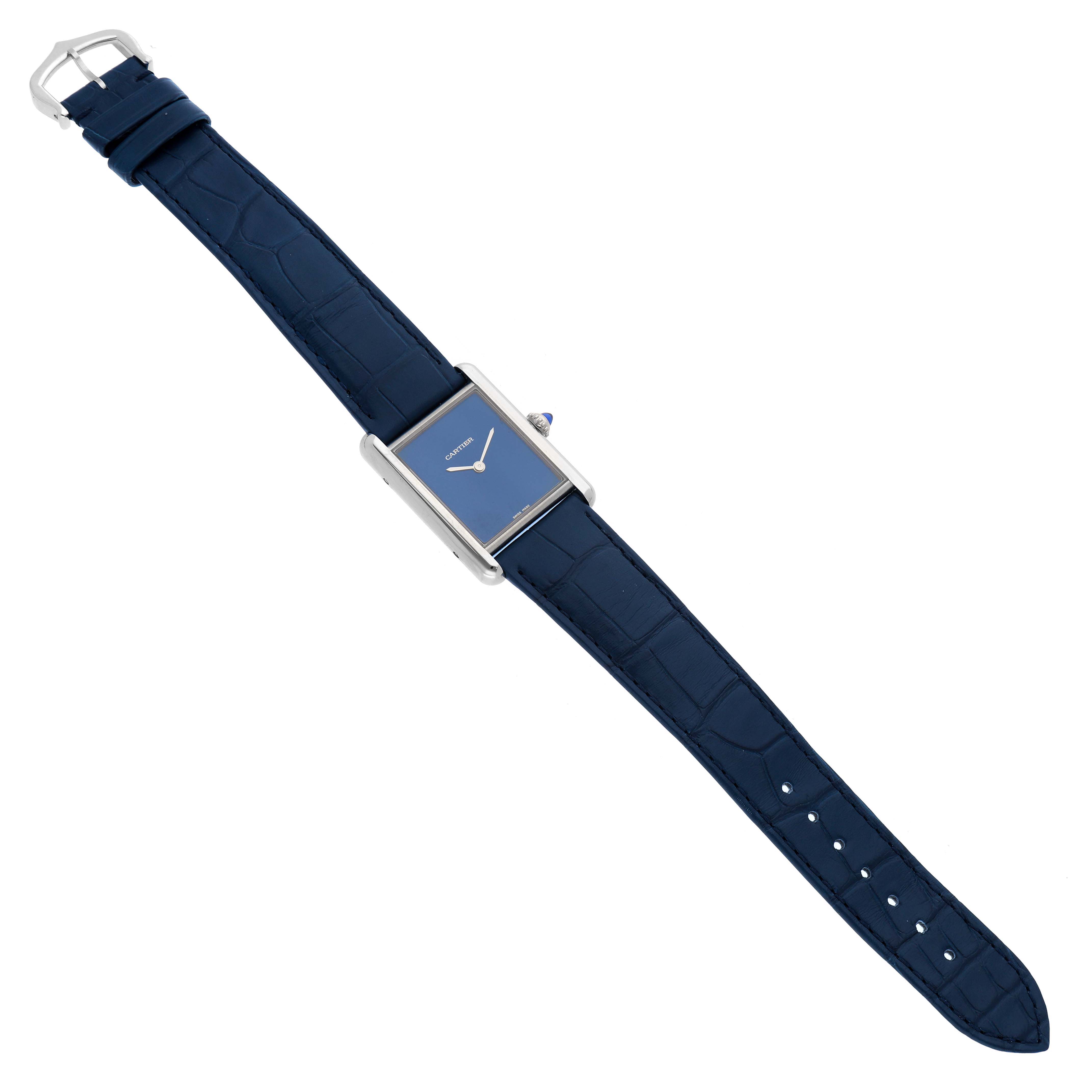 The image shows a Cartier Tank Must WSTA0055 Women's Stainless Steel Blue Dial watch from a top-down angle, displaying the dial, strap, and buckle.