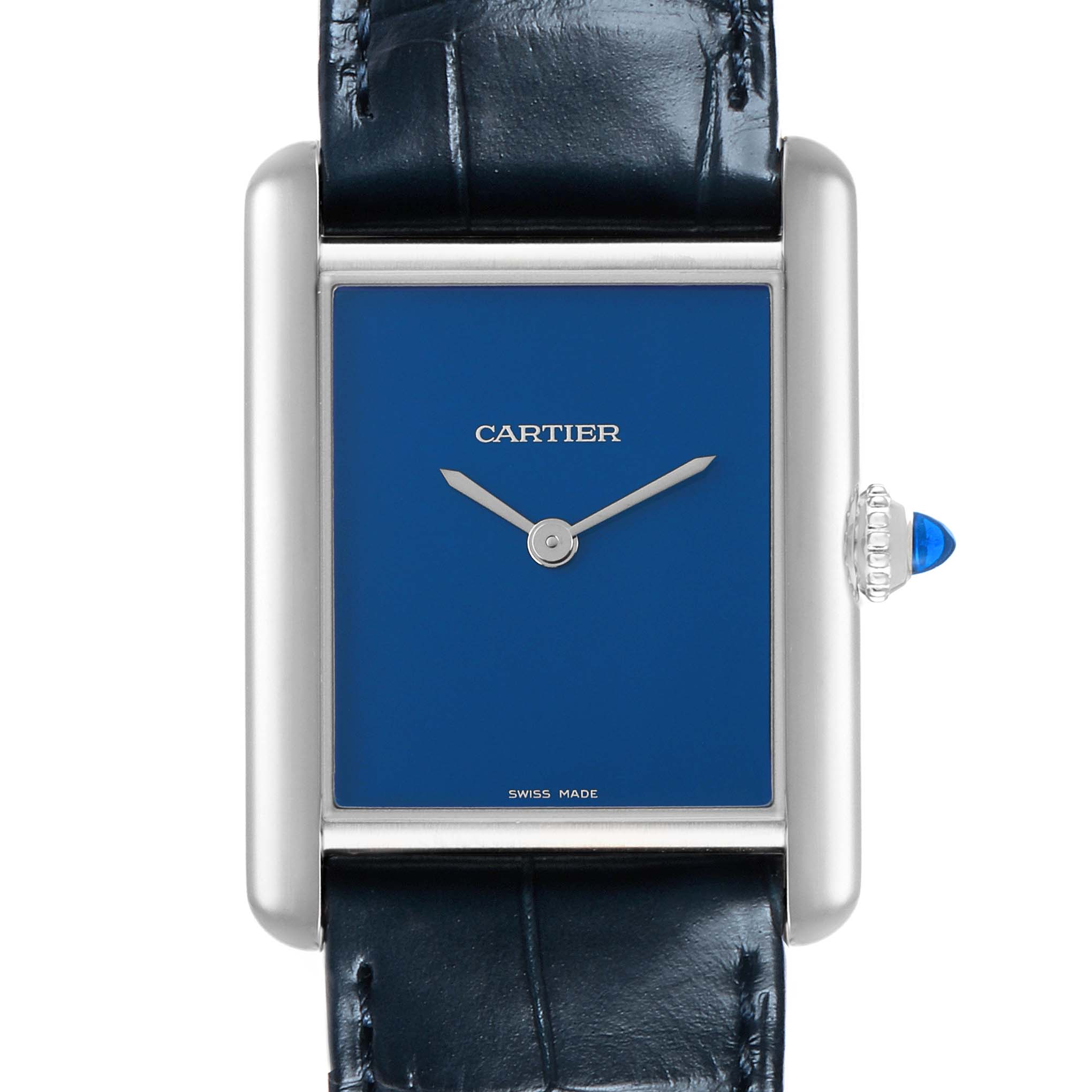 The Cartier Tank Must WSTA0055 Women's Stainless Steel Blue Dial watch is shown from a frontal angle, highlighting its rectangular blue dial and leather strap, with a visible crown.