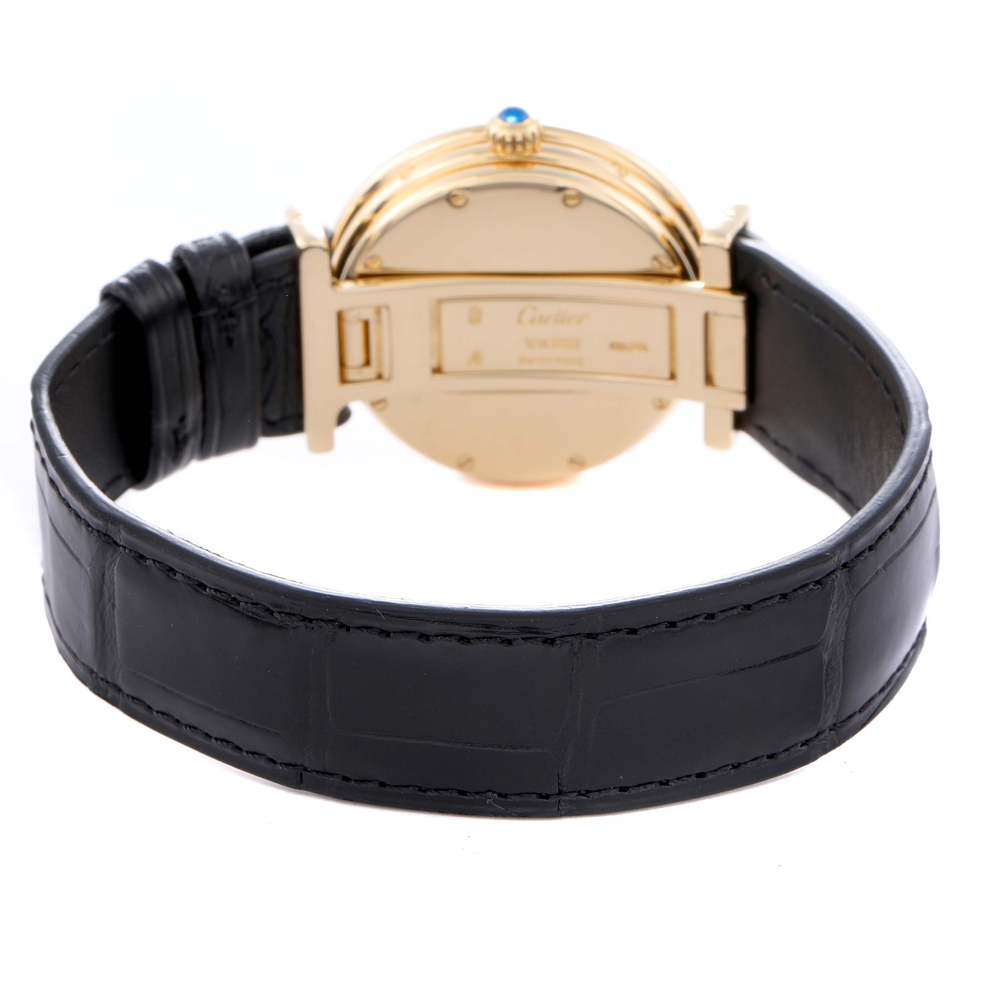 The image shows a Vendome model by Cartier from the back, highlighting the clasp, case, and black strap.