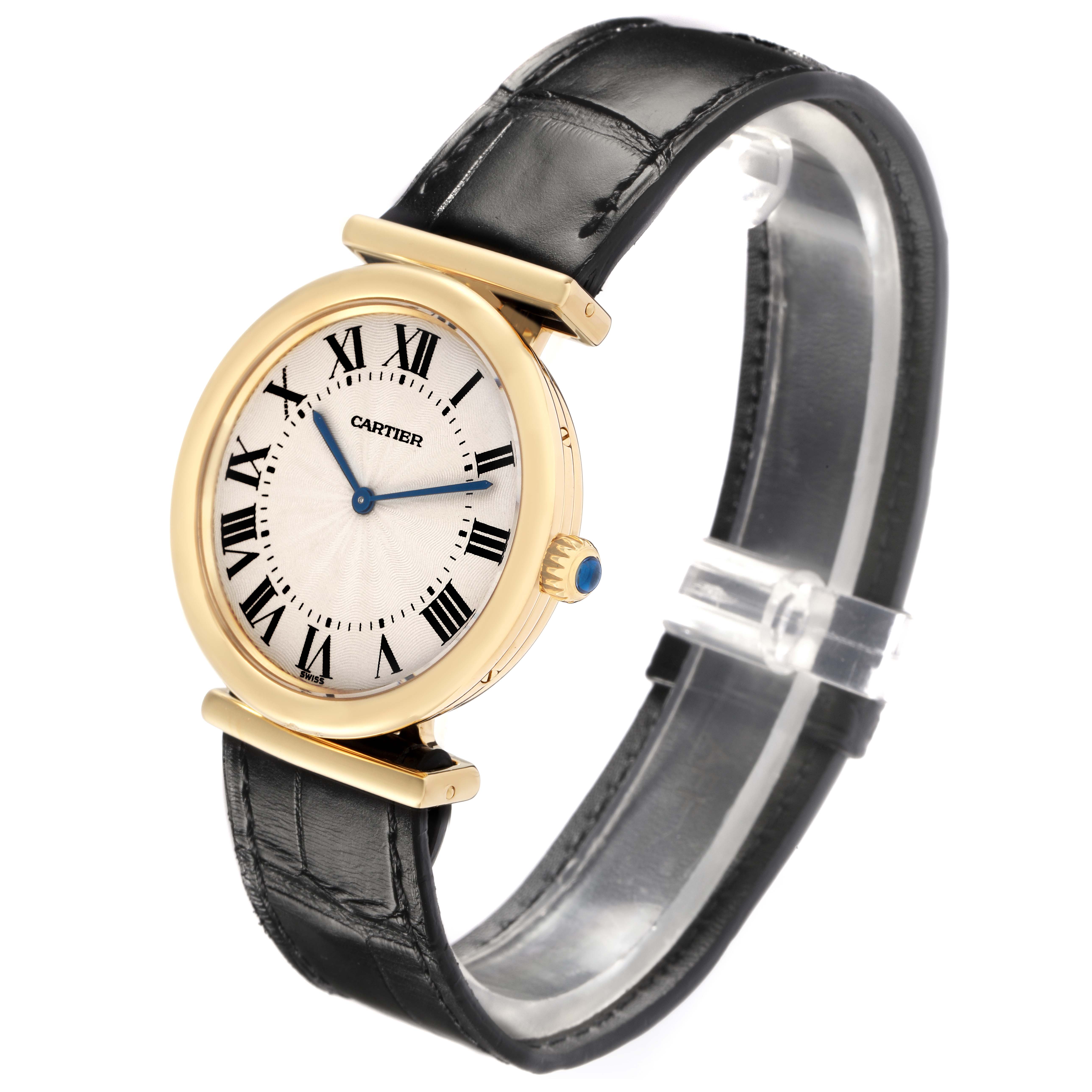 The Cartier Vendome W1514457 Men
s Yellow Gold Silver Dial W1514457 Men
s Yellow Gold Silver Dial watch is shown at a slight angle, displaying the face, bezel, crown, and leather strap.