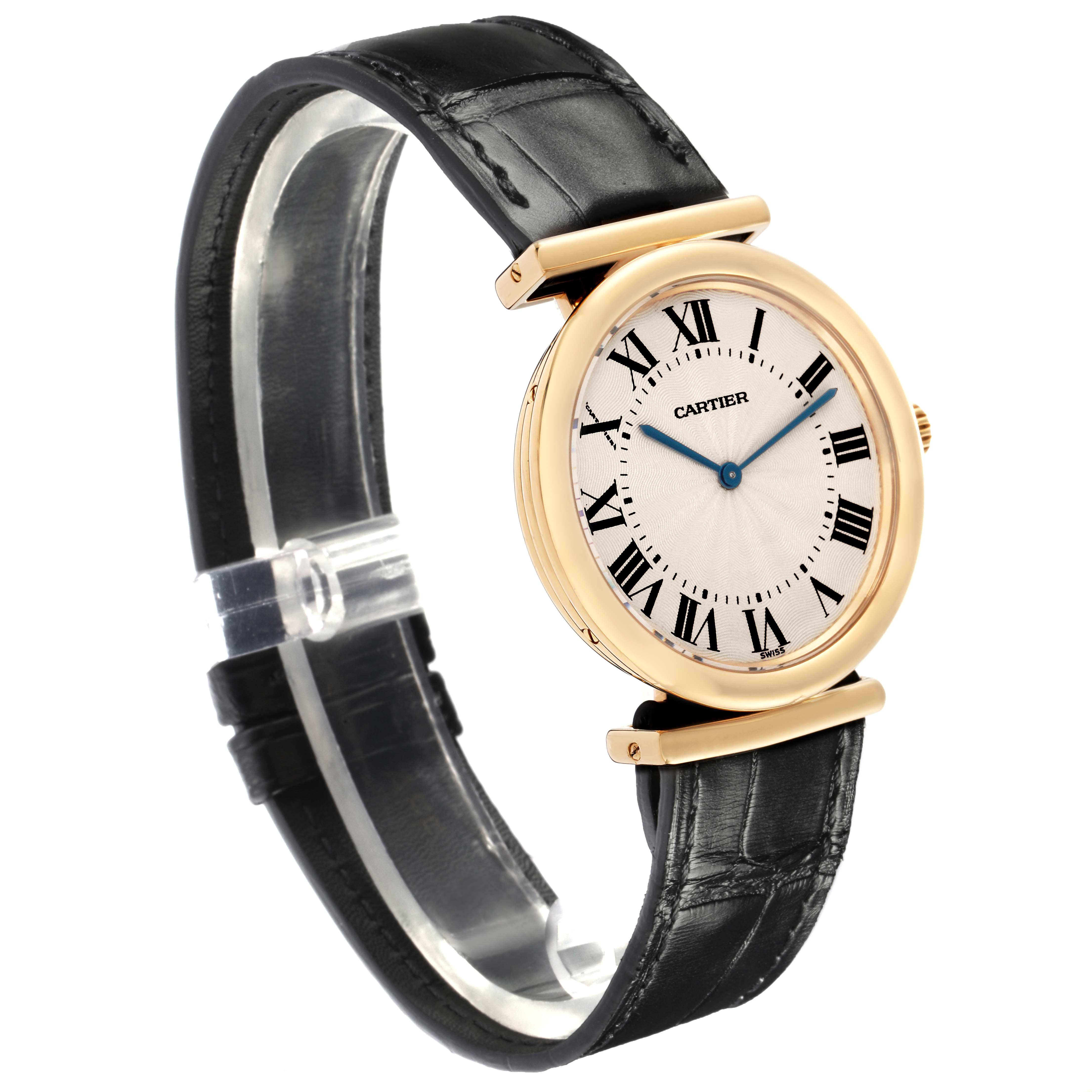 The Cartier Vendome W1514457 Men
s Yellow Gold Silver Dial W1514457 Men
s Yellow Gold Silver Dial watch is shown at a three-quarter angle highlighting its round face, Roman numerals, and leather strap.