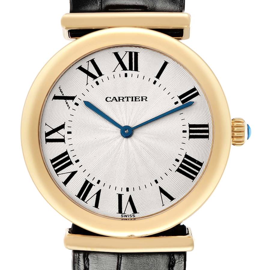 The Cartier Vendome watch is shown from a front angle, highlighting the dial, Roman numerals, blue hands, and a gold case with a crown.