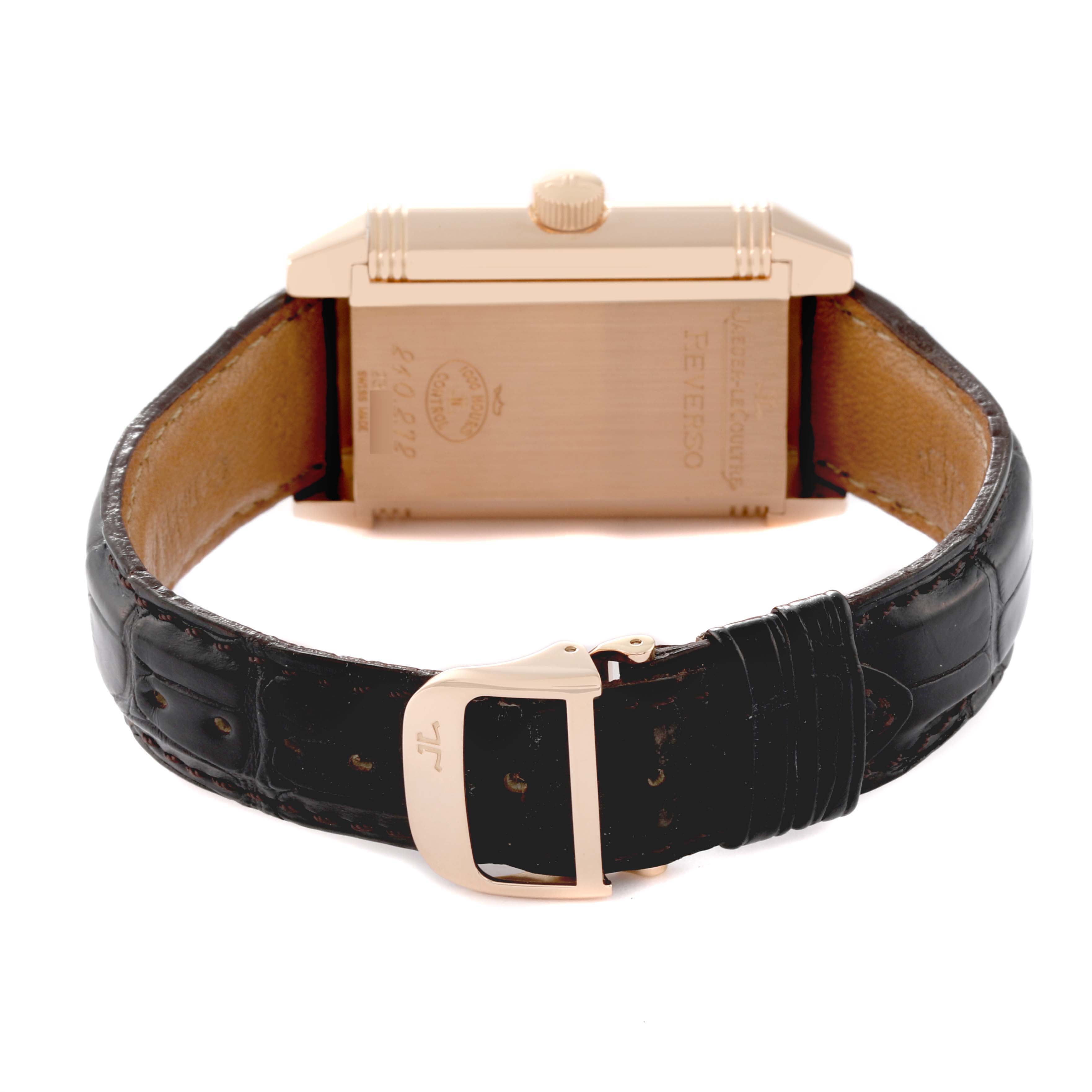 The image shows the back view of a Jaeger LeCoultre Reverso Q3032420 Men's Rose Gold Silver Dial Q3032420 Men's Rose Gold Silver Dial watch, highlighting the case back and leather strap with clasp.