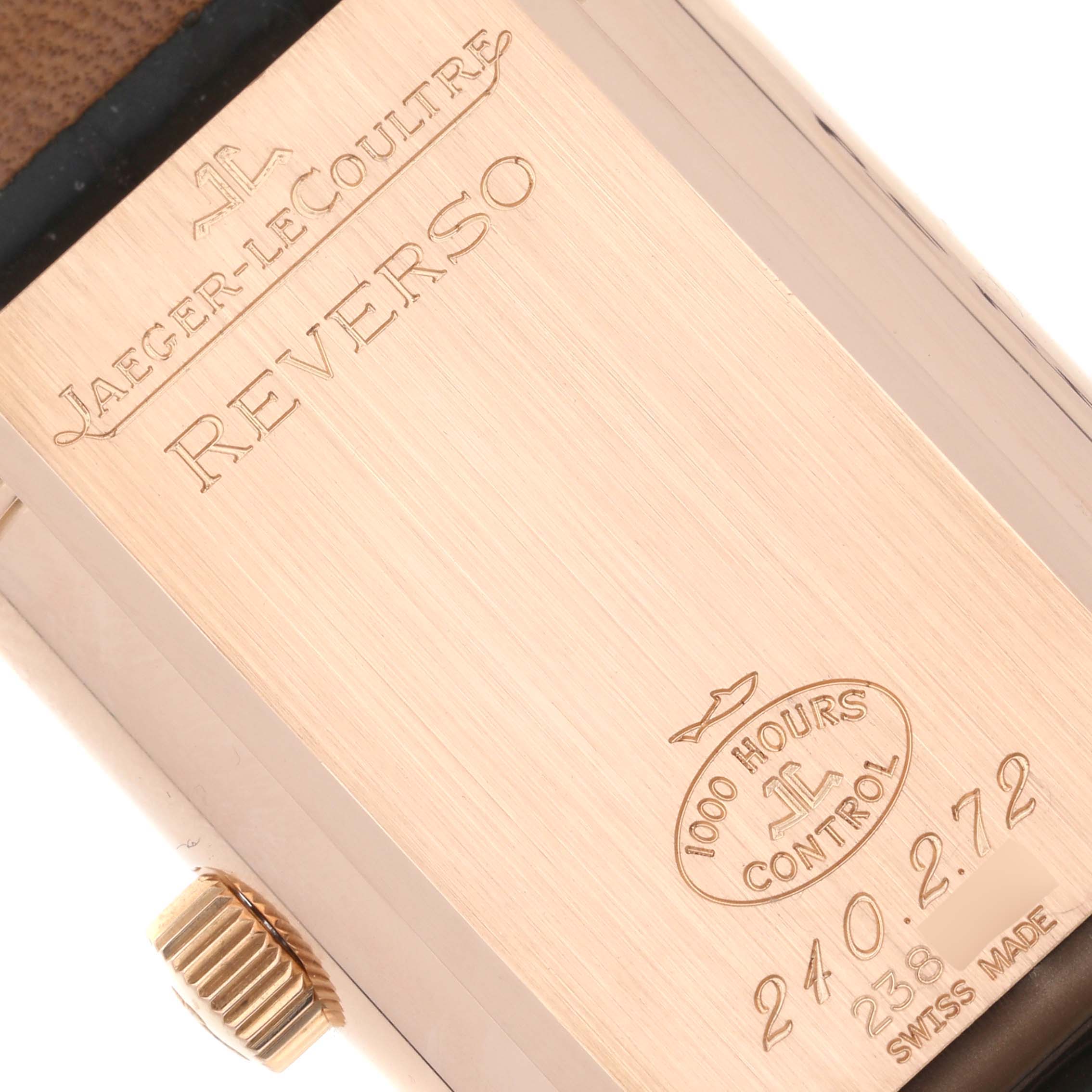 This is a close-up image showing the back case and crown of a Jaeger LeCoultre Reverso Q3032420 Men's Rose Gold Silver Dial Q3032420 Men's Rose Gold Silver Dial watch.