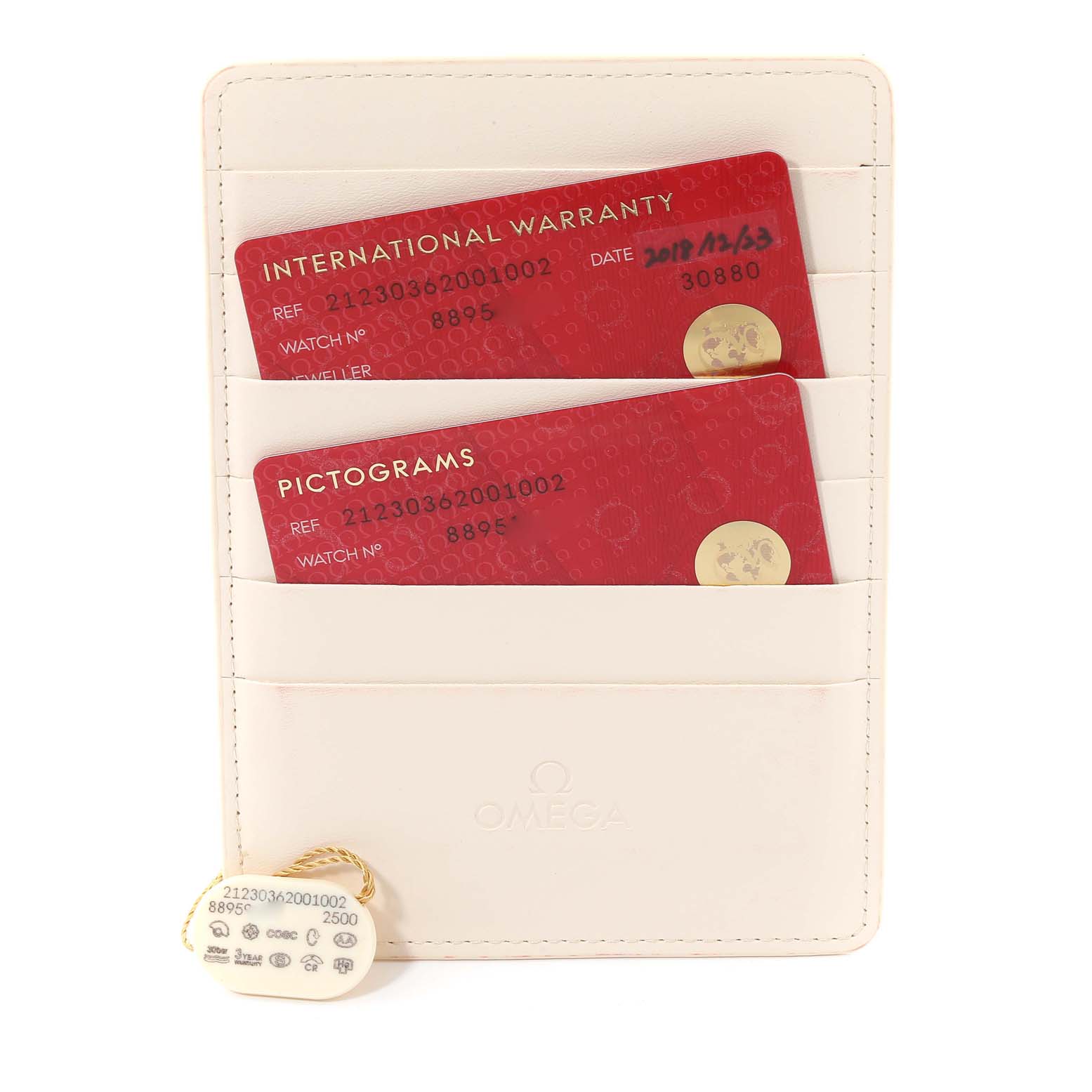 The image shows an Omega Seamaster 212.30.36.20.01.002 Men
s Stainless Steel Black Dial 212.30.36.20.01.002 Men
s Stainless Steel Black Dial model
s international warranty and pictograms cards, along with a tag, held in a white cardholder.