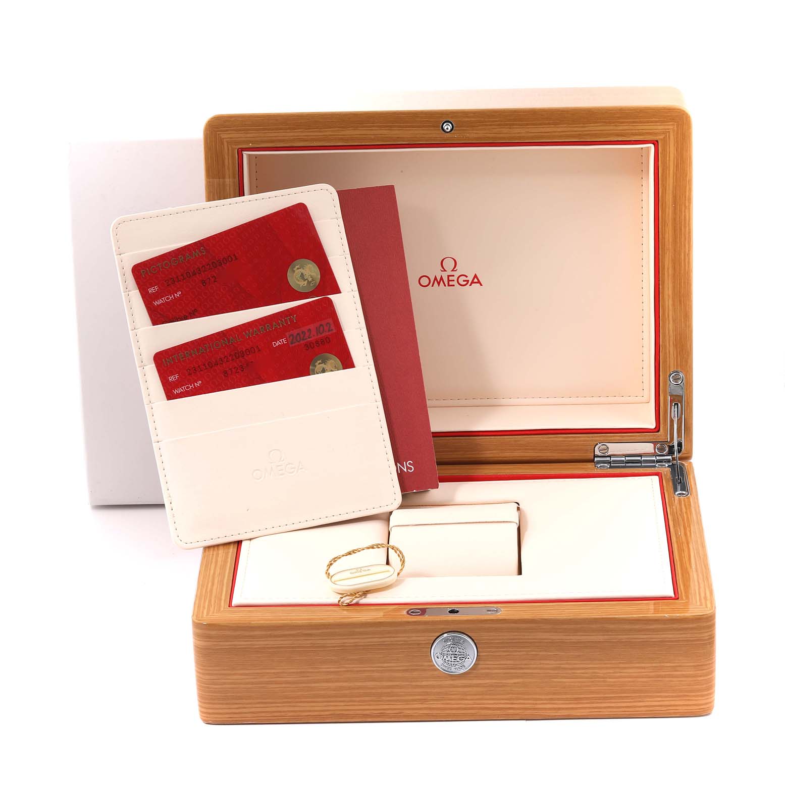 The image shows the packaging of an Omega Aqua Terra 231.10.43.22.03.001 Men
s Stainless Steel Blue Dial 231.10.43.22.03.001 Men
s Stainless Steel Blue Dial watch, including the warranty cards and a wooden box.