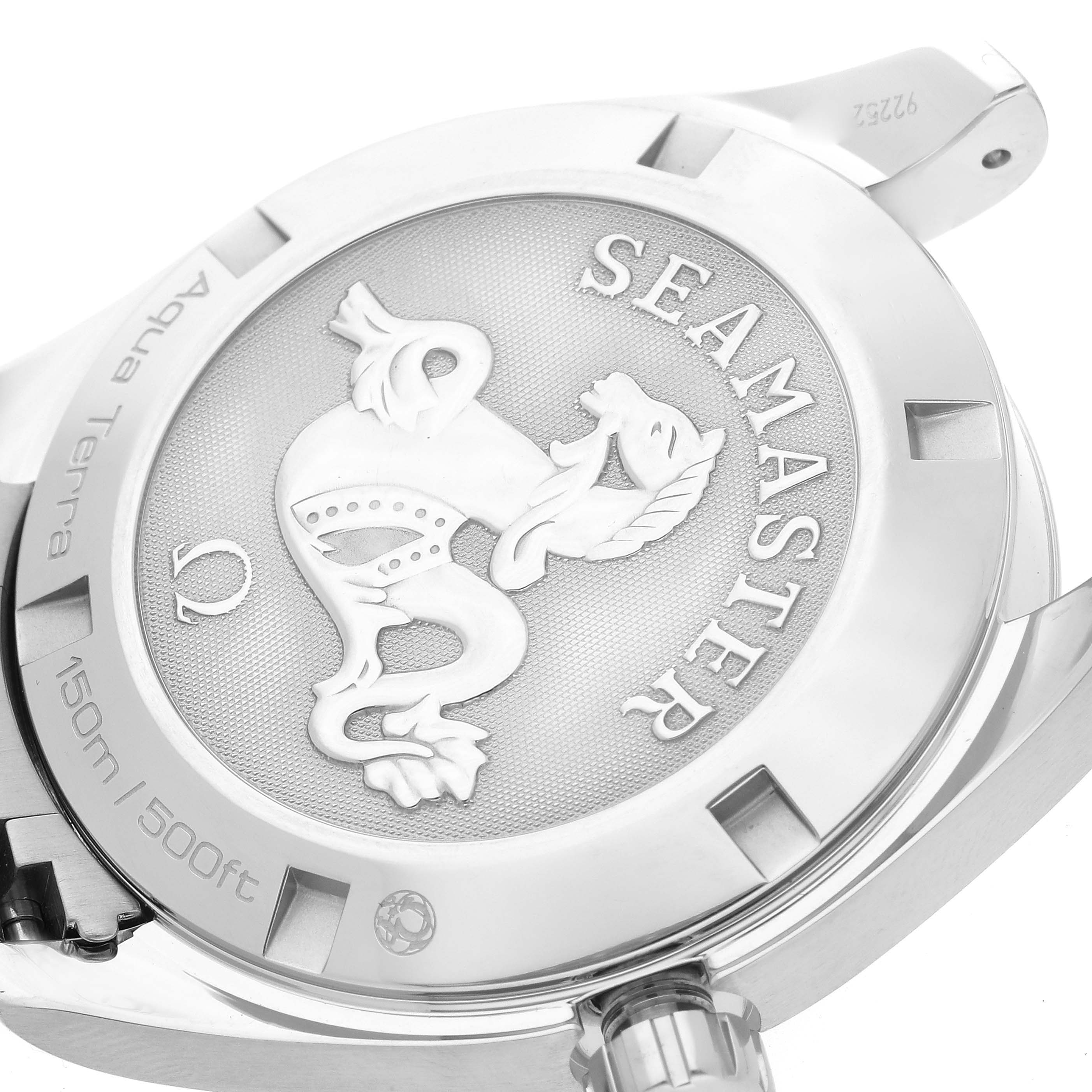 The image shows a close-up of the Omega Seamaster Aqua Terra watch's case back, featuring the Seahorse emblem and model engraving.
