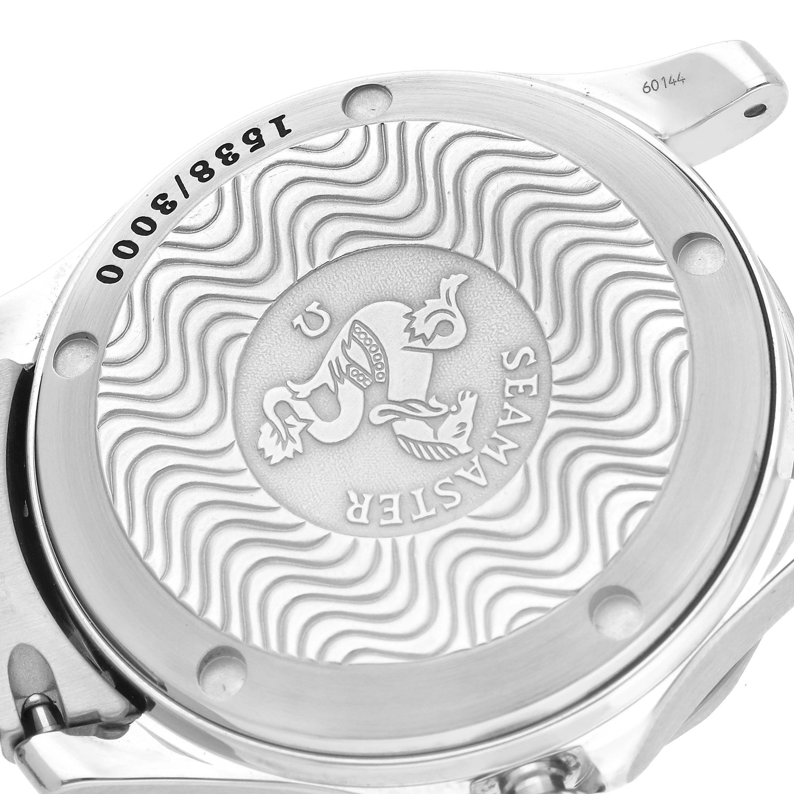 This image shows the case back of an Omega Seamaster 2553.41.00 Men's Stainless Steel Green Dial 2553.41.00 Men's Stainless Steel Green Dial watch, featuring the engraved logo and wavy pattern.