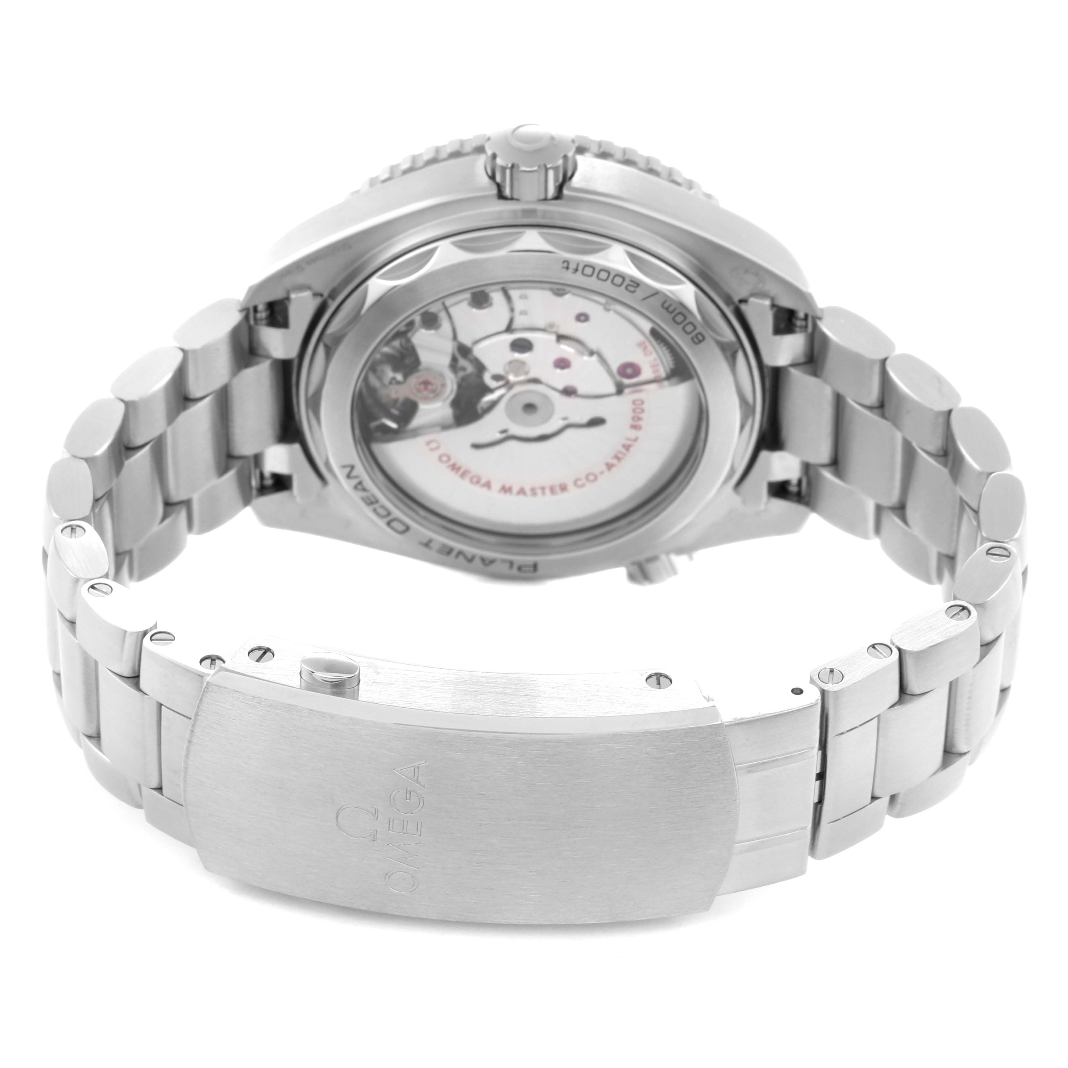 The image shows the back of the Omega Planet Ocean 215.30.44.21.01.001 Men
s Stainless Steel Black Dial 215.30.44.21.01.001 Men
s Stainless Steel Black Dial watch, highlighting the movement through the transparent case back and the bracelet clasp.