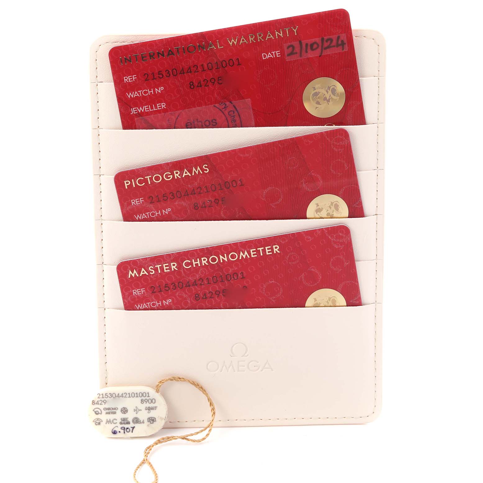 The image shows warranty and pictogram cards along with a chronometer card for the Omega Planet Ocean 215.30.44.21.01.001 Men
s Stainless Steel Black Dial 215.30.44.21.01.001 Men
s Stainless Steel Black Dial model.