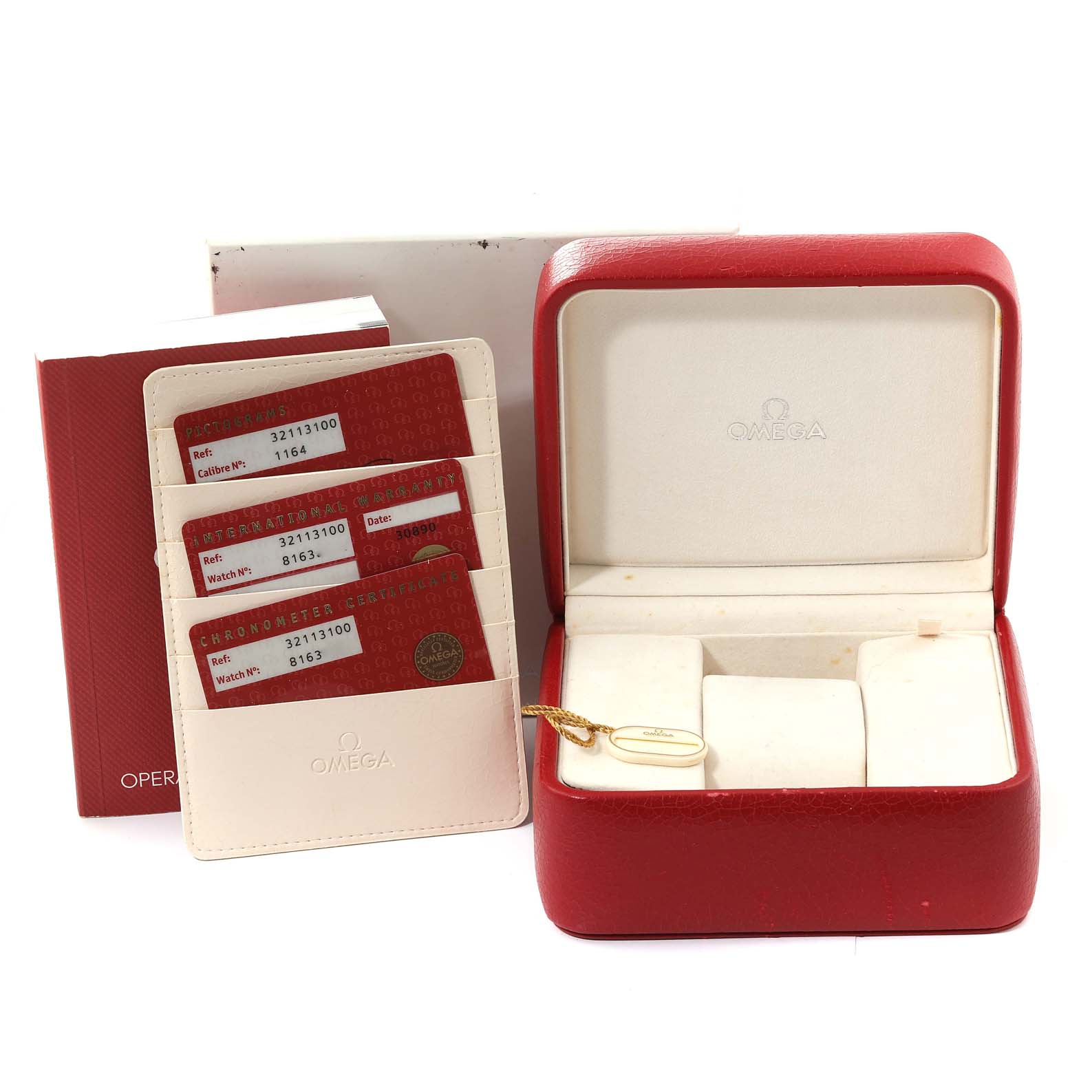 The image shows a watch box, warranty cards, and a manual for the Omega Speedmaster 3211.31.00 Men
s Stainless Steel Silver Dial 3211.31.00 Men
s Stainless Steel Silver Dial.