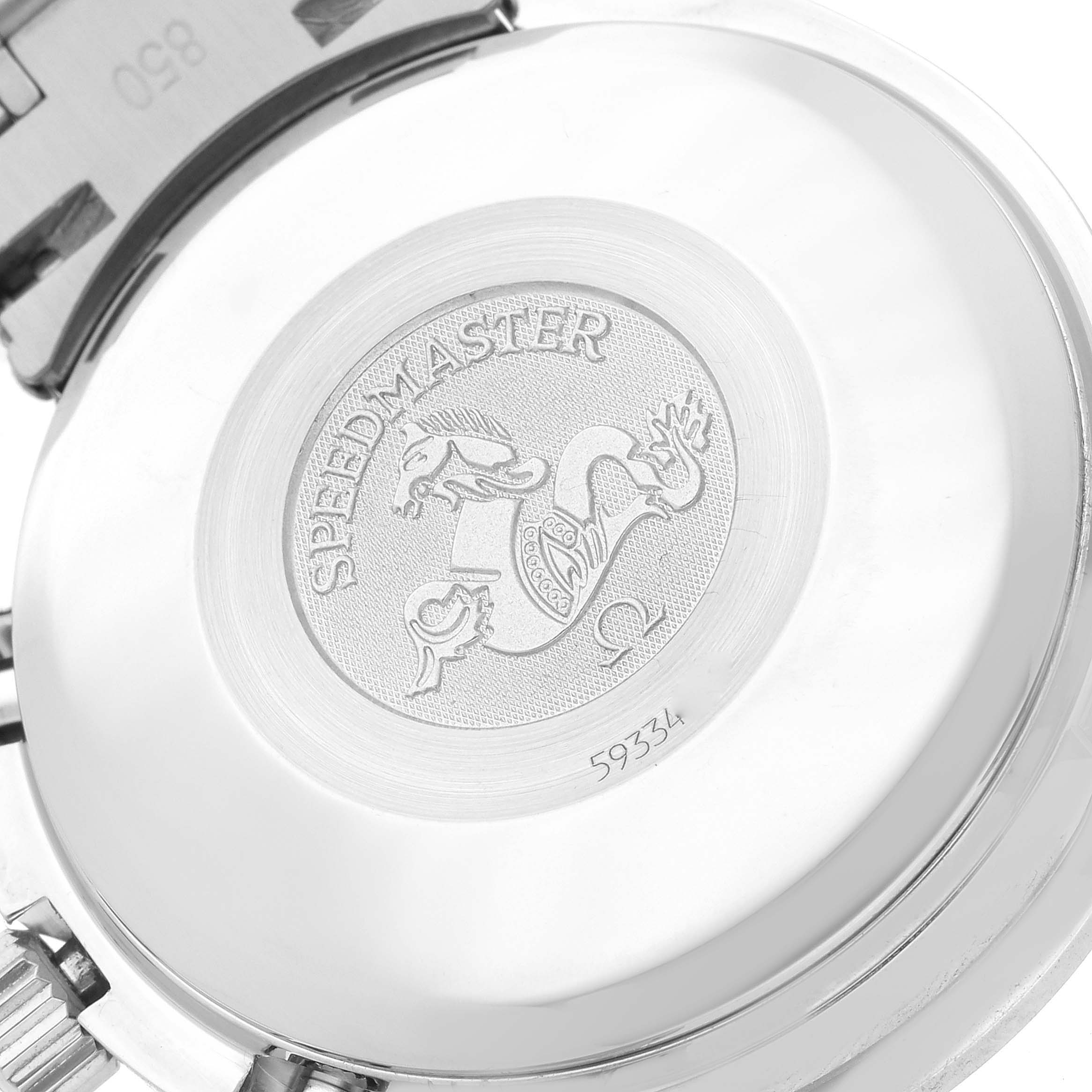 The image shows the case back of an Omega Speedmaster 3513.30.00 Men
s Stainless Steel Silver Dial 3513.30.00 Men
s Stainless Steel Silver Dial watch, highlighting the engraved emblem and serial number.