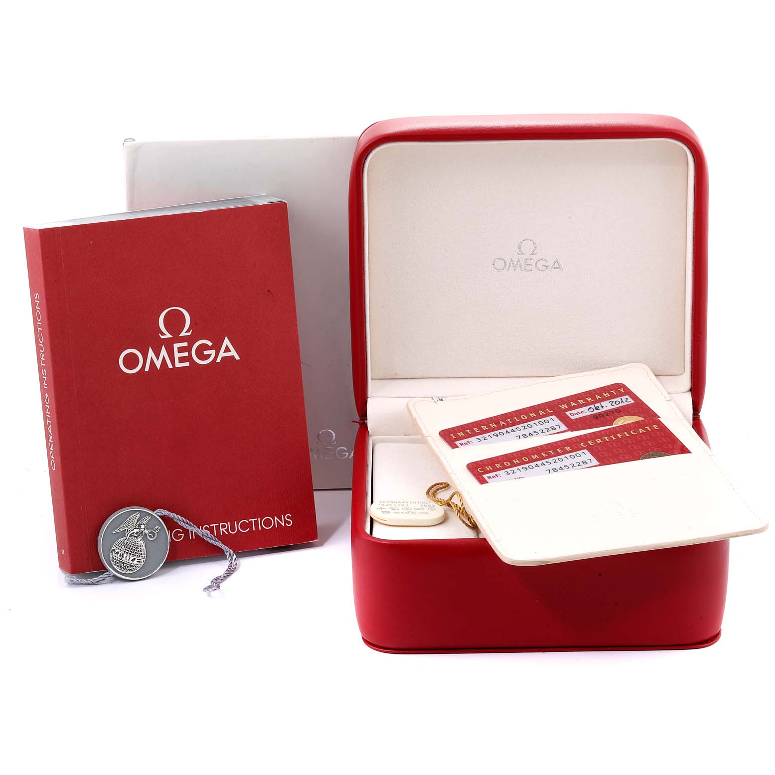 The image shows accessories for the Omega Speedmaster 321.90.44.52.01.001 Men's Titanium Black Dial 321.90.44.52.01.001 Men's Titanium Black Dial model, including a warranty card, manual, and a red watch box.
