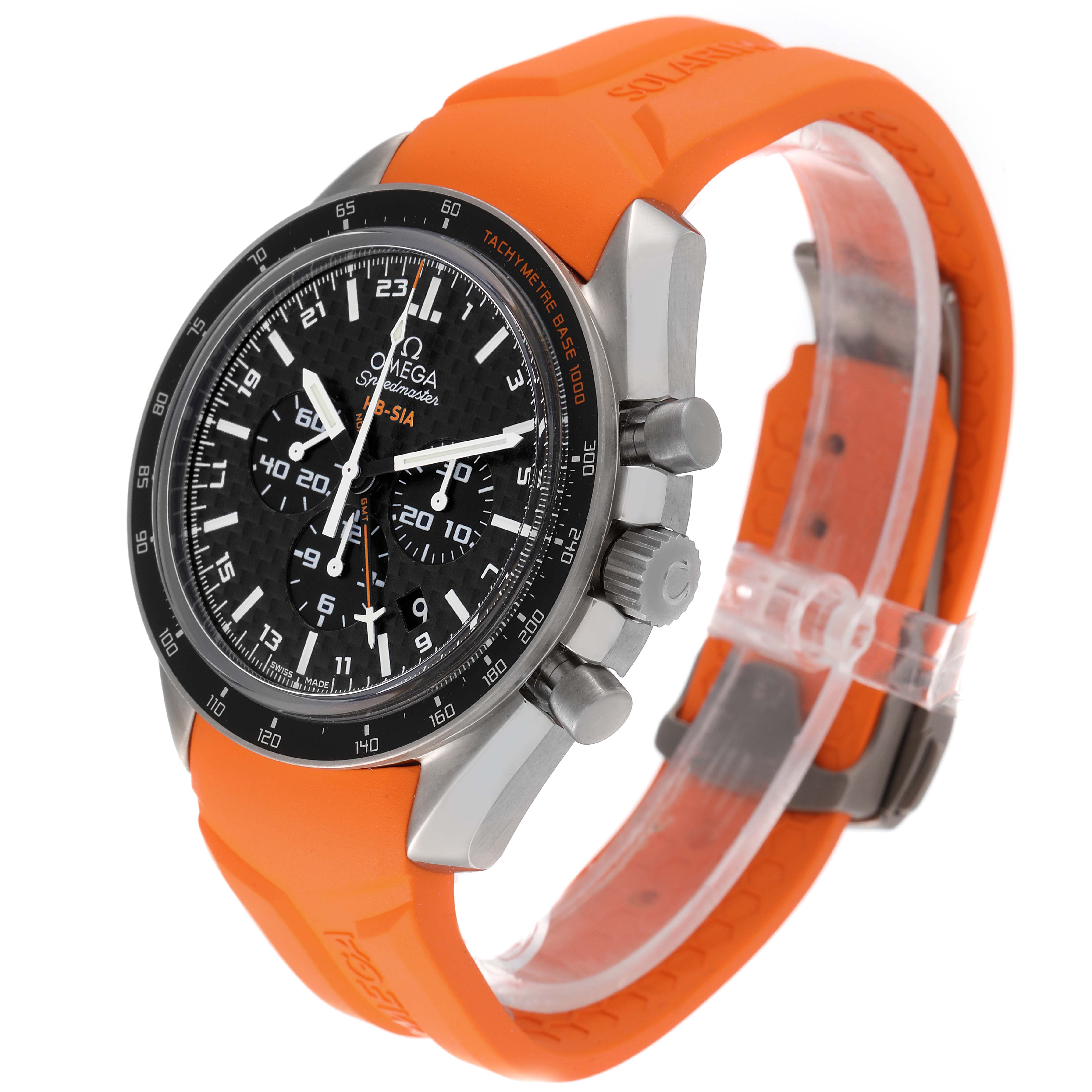The image shows an Omega Speedmaster 321.92.44.52.01.003 Men
s Titanium Black Dial 321.92.44.52.01.003 Men
s Titanium Black Dial watch with an orange strap, viewed from an angle displaying the face, bezel, and side pushers.