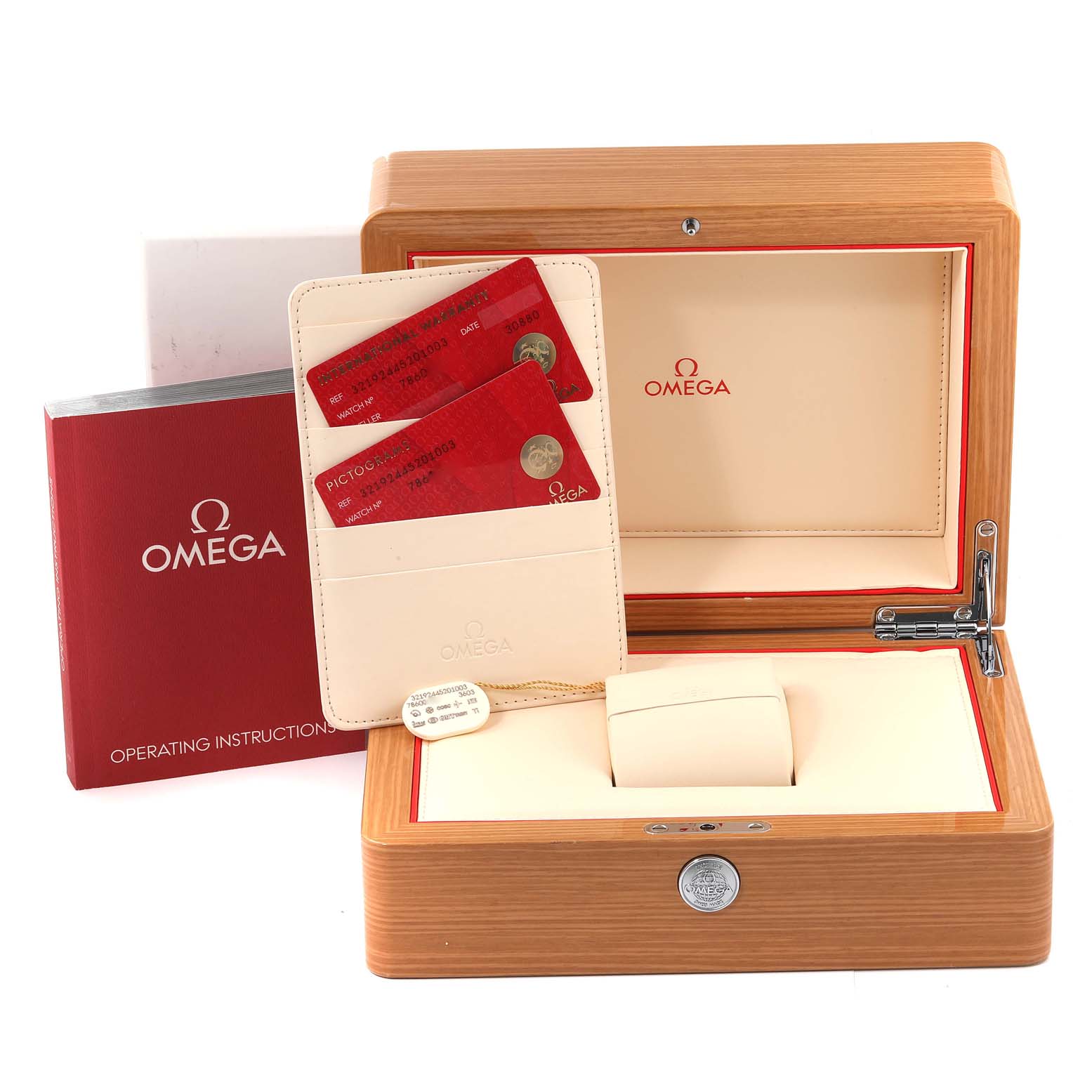 The image shows the Omega Speedmaster 321.92.44.52.01.003 Men
s Titanium Black Dial 321.92.44.52.01.003 Men
s Titanium Black Dial watch
s box, operating instructions, warranty cards, and a leather cardholder.