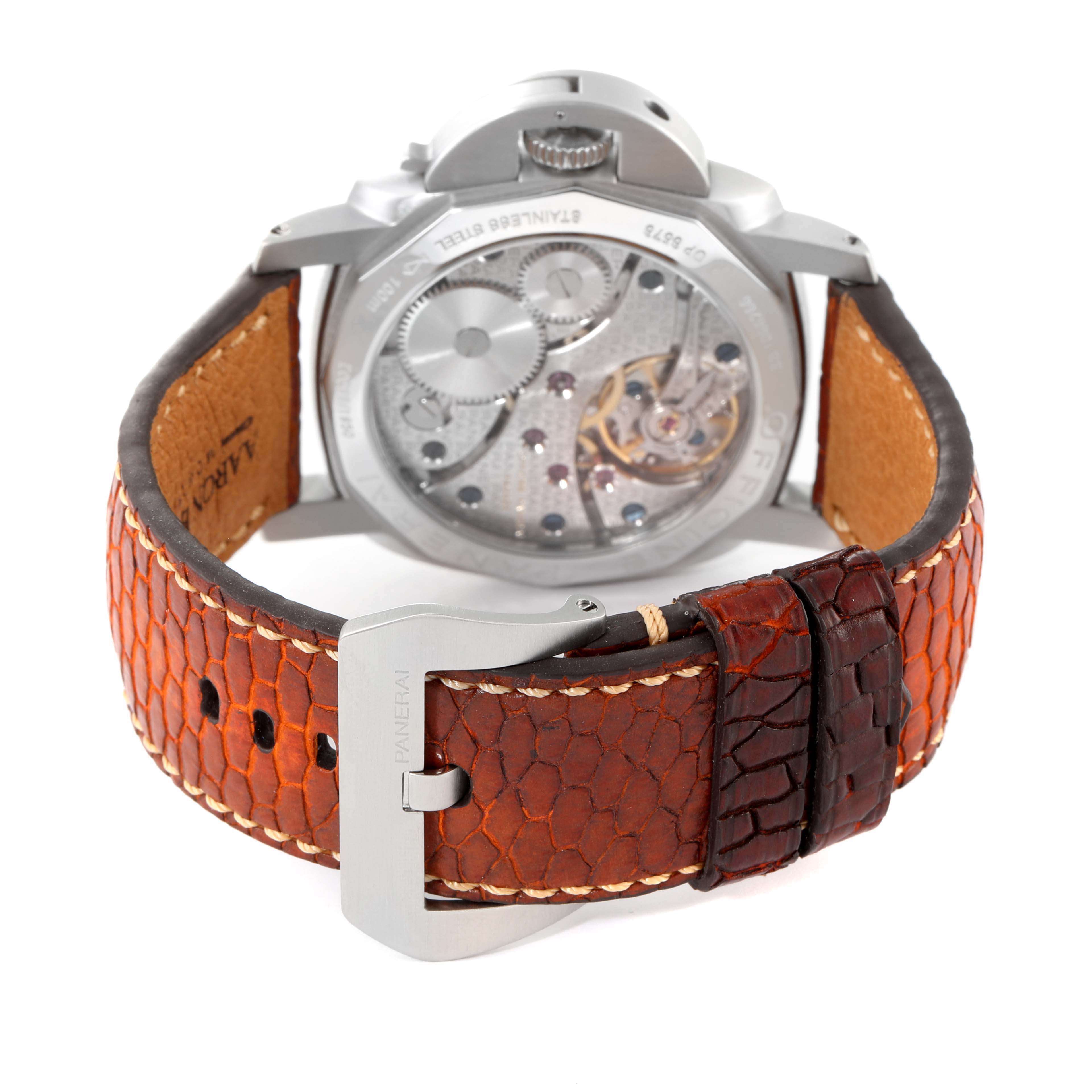 The image shows the back view of a Panerai Luminor PAM00127 Men
s Stainless Steel Black Dial PAM00127 Men
s Stainless Steel Black Dial watch, highlighting its transparent case back and brown textured leather strap.