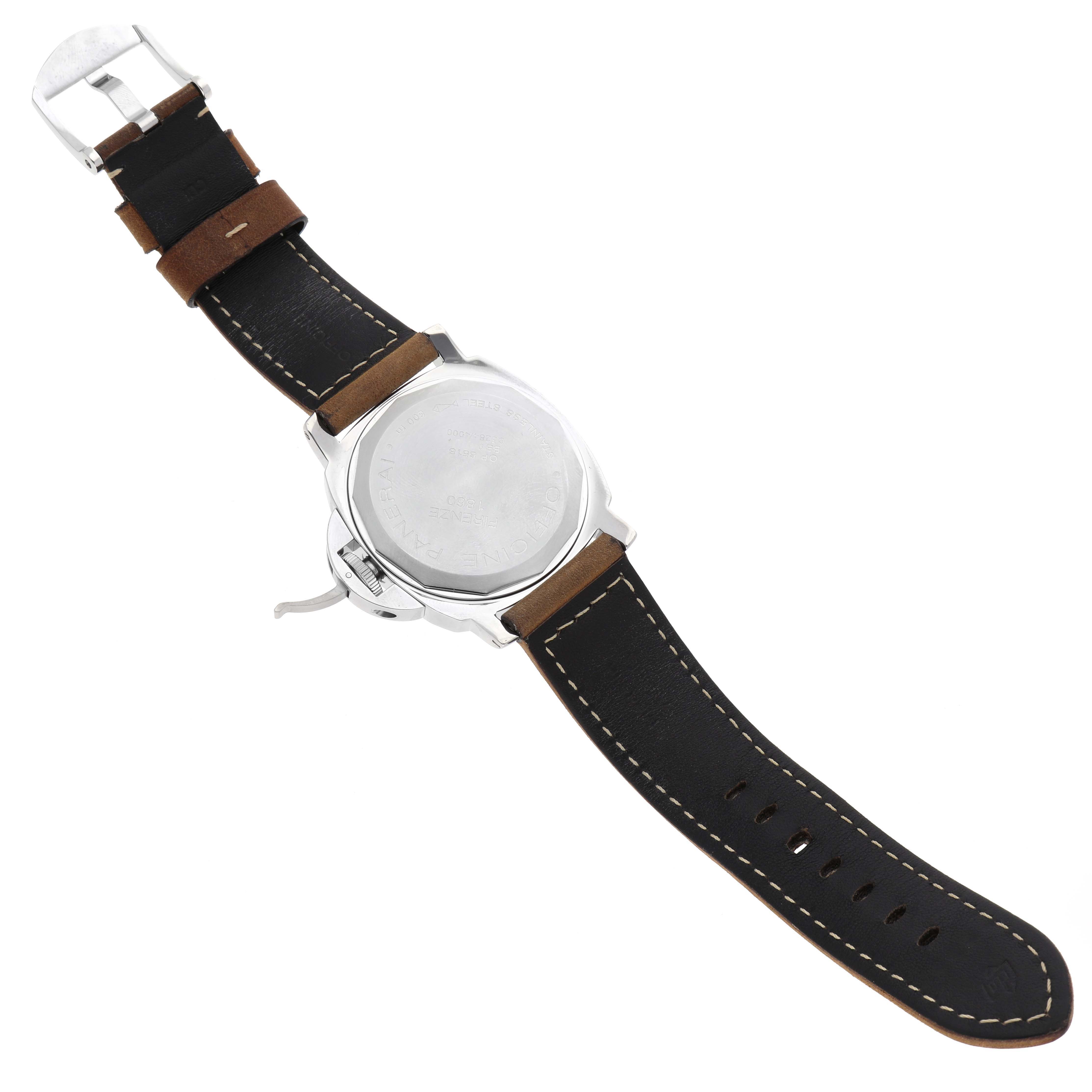 The image shows the back view of a Panerai Luminor PAM00001 Men's Stainless Steel Black Dial PAM00001 Men's Stainless Steel Black Dial watch, including its case back and black leather strap with a brown lining.