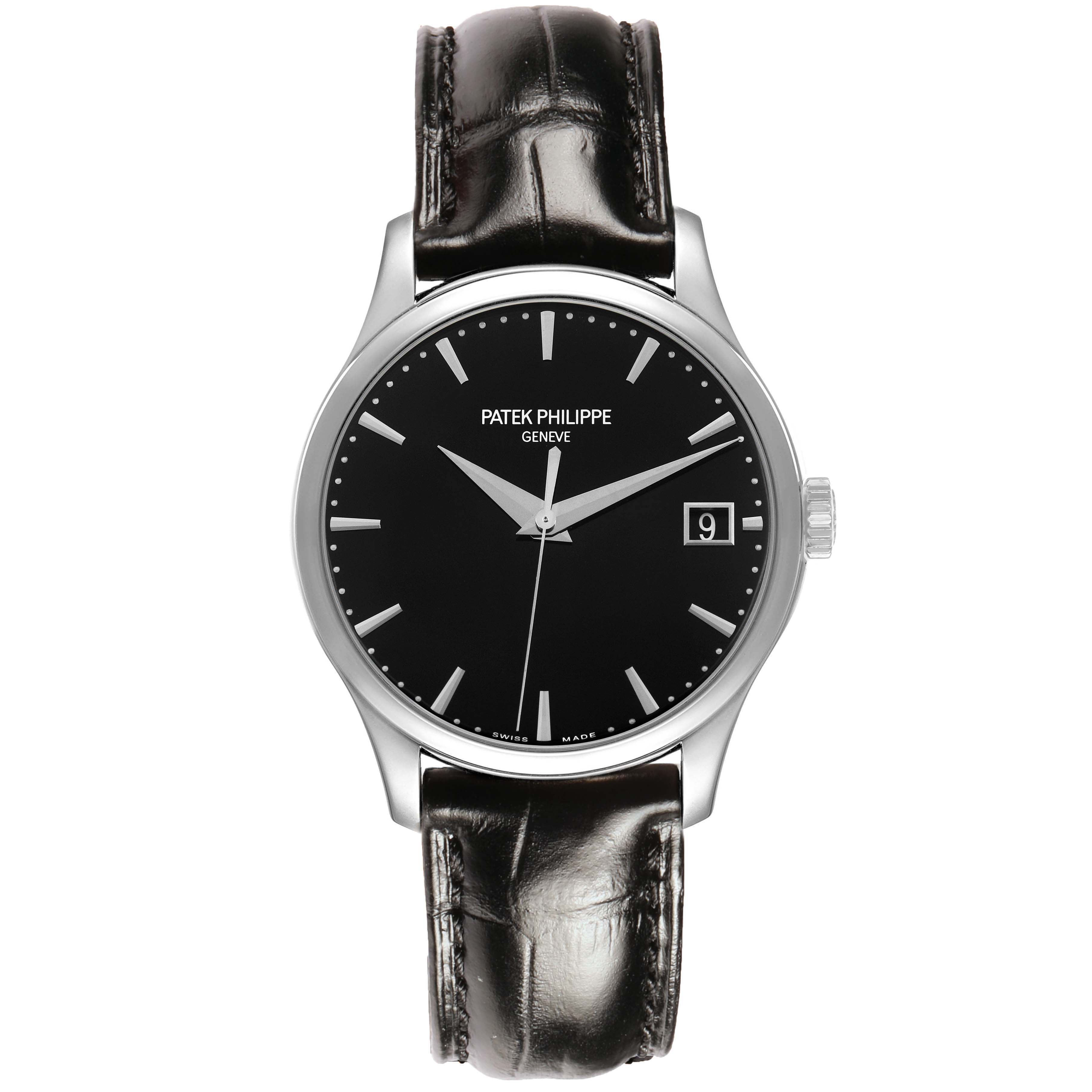 The Patek Philippe Calatrava 5227G-010 Men's White Gold Black Dial watch is shown from a front angle, displaying the face, hands, dial, and leather strap.