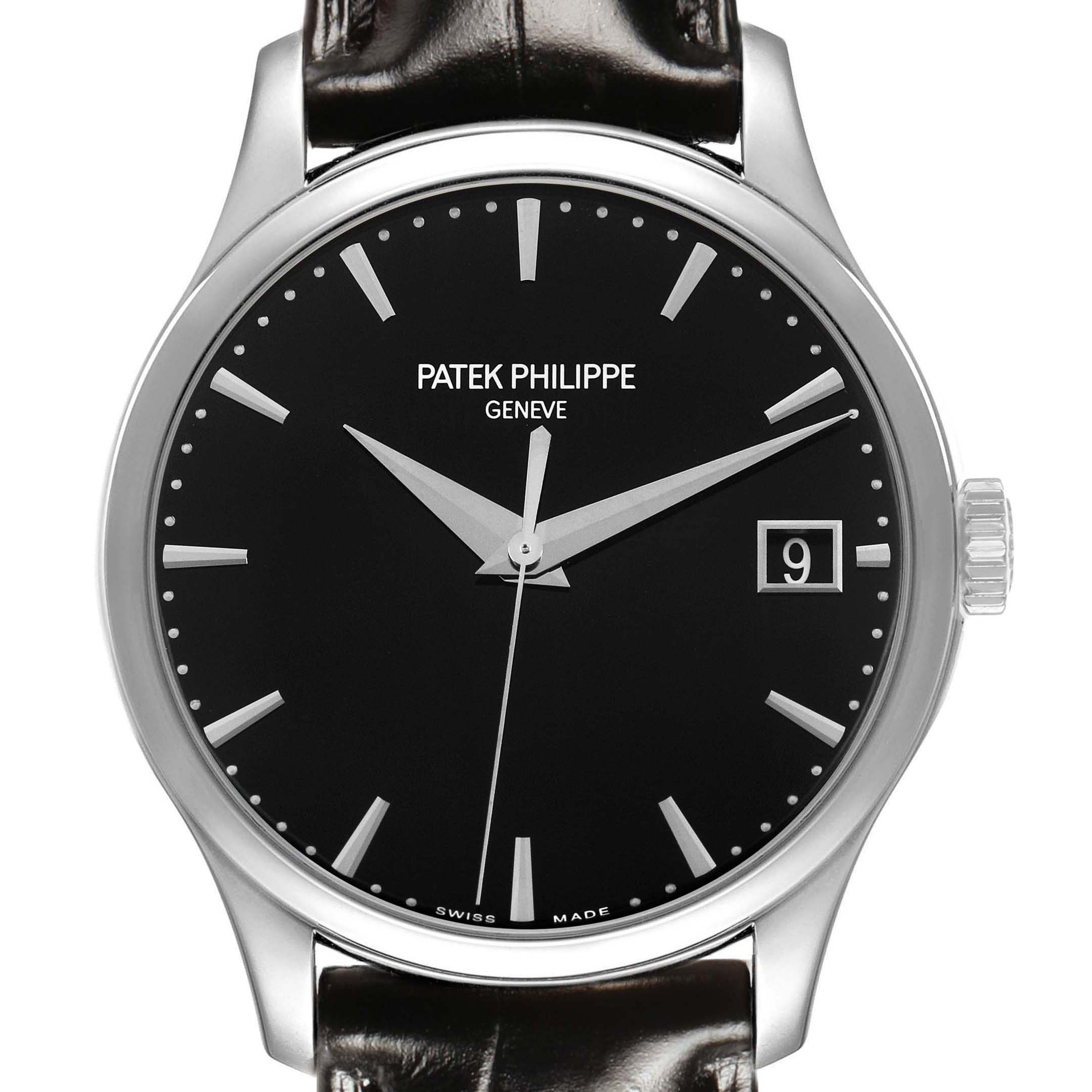 The image shows a frontal view of the Patek Philippe Calatrava 5227G-010 Men's White Gold Black Dial watch, highlighting the dial, hands, and crown.