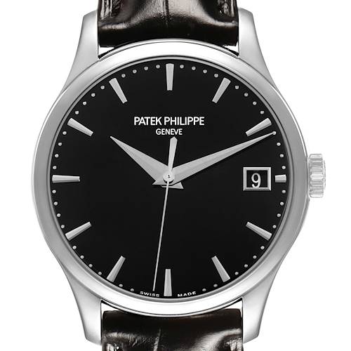 The image shows a front view of the Patek Philippe Calatrava 5227G-010 Men's White Gold Black Dial watch, highlighting the dial, hands, date window, and part of the strap.