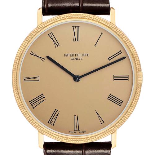 The Patek Philippe Calatrava 3588J Men's Yellow Gold Beige Dial watch is shown from the front, displaying its dial, hands, bezel, and part of the leather strap.