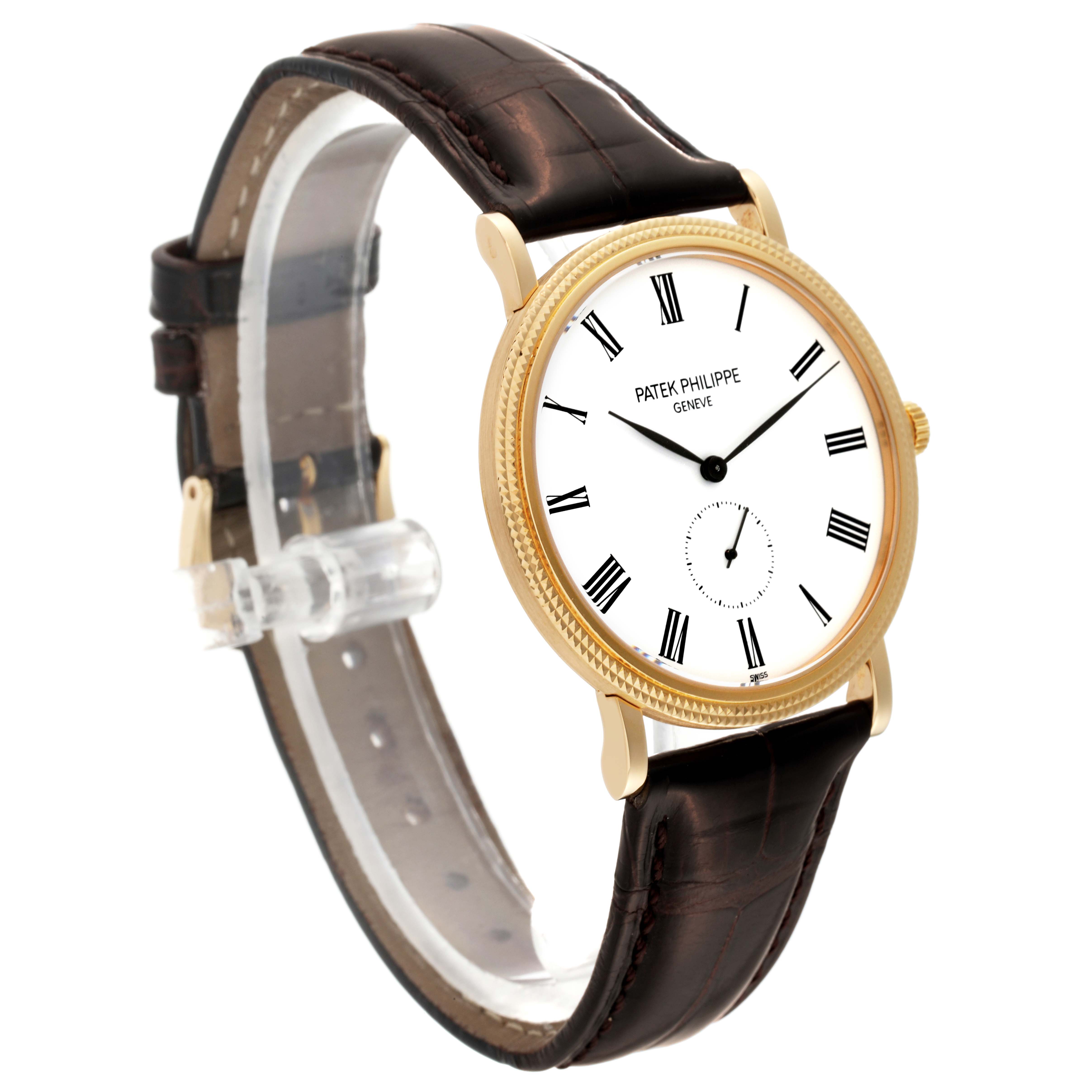 The image shows a side and front view of a Patek Philippe Calatrava 5119J Men's Yellow Gold White Dial 5119J Men's Yellow Gold White Dial watch with a gold case and brown leather strap.