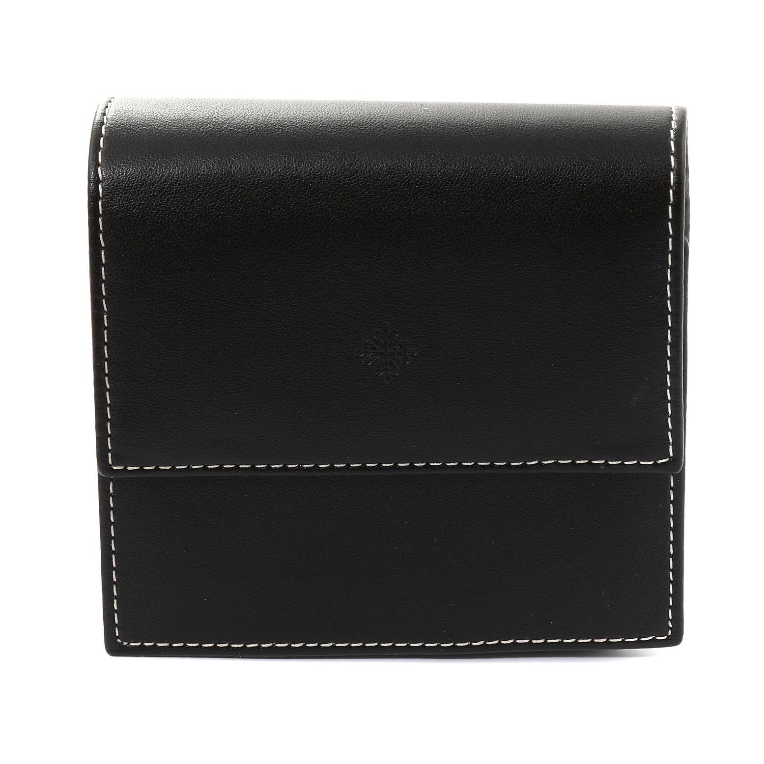 The image shows a black leather watch case with white stitching for a Vintage Patek Philippe model.