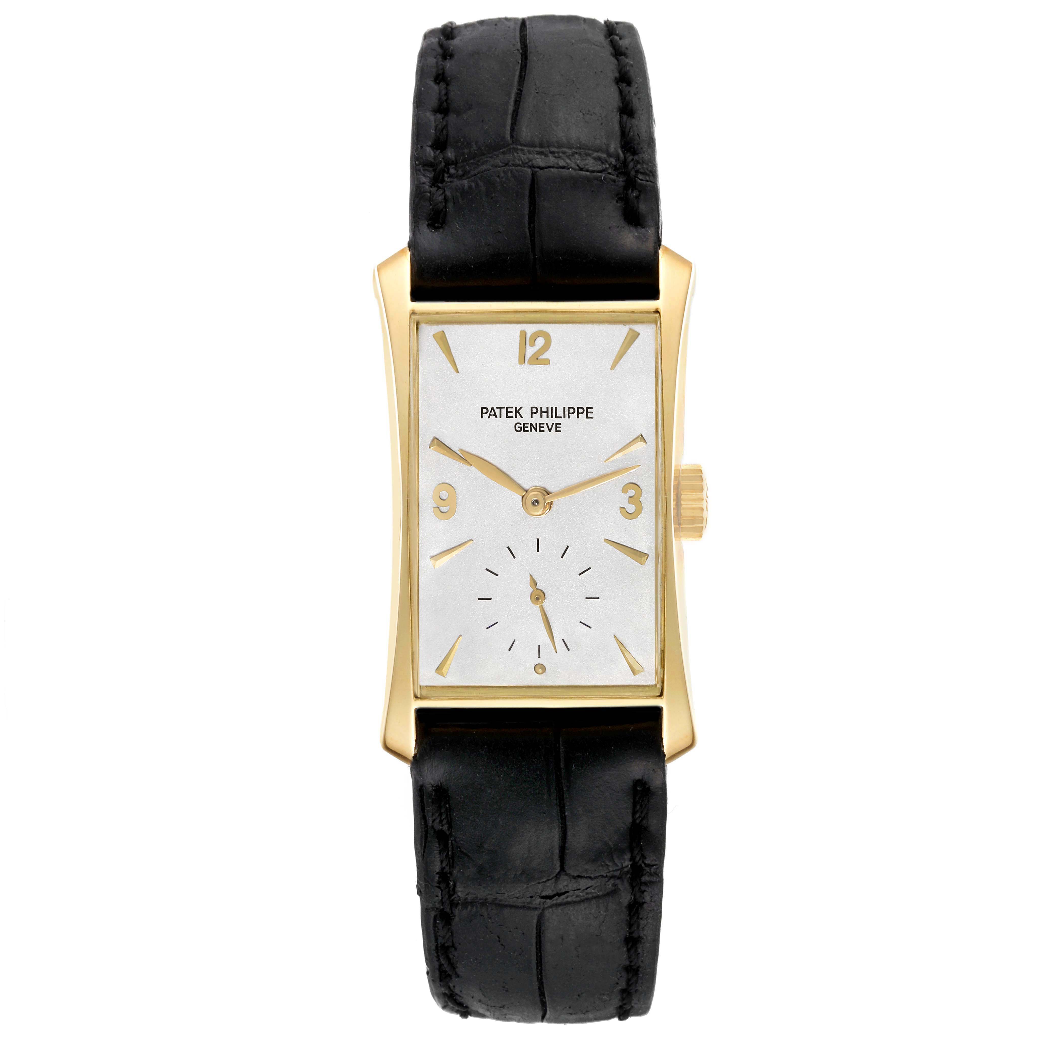 The Patek Philippe Vintage 2468 Men's Yellow Gold Silver Dial watch is shown from a top-down angle, displaying the rectangular case, face, and black leather strap.